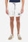 Plain men's swimming shorts made of nylon. Elastic waistband with a personalised drawstring for waist adjustment. On the inside of the shorts is an elasticated mesh brief. Double side pocket on the hips and patch pocket with flap on the back, on the right side only. The large logo is embroidered in a contrasting colour thread on the bottom of the left leg on the front. Regular fit. The model is wearing a size L. - Optic White