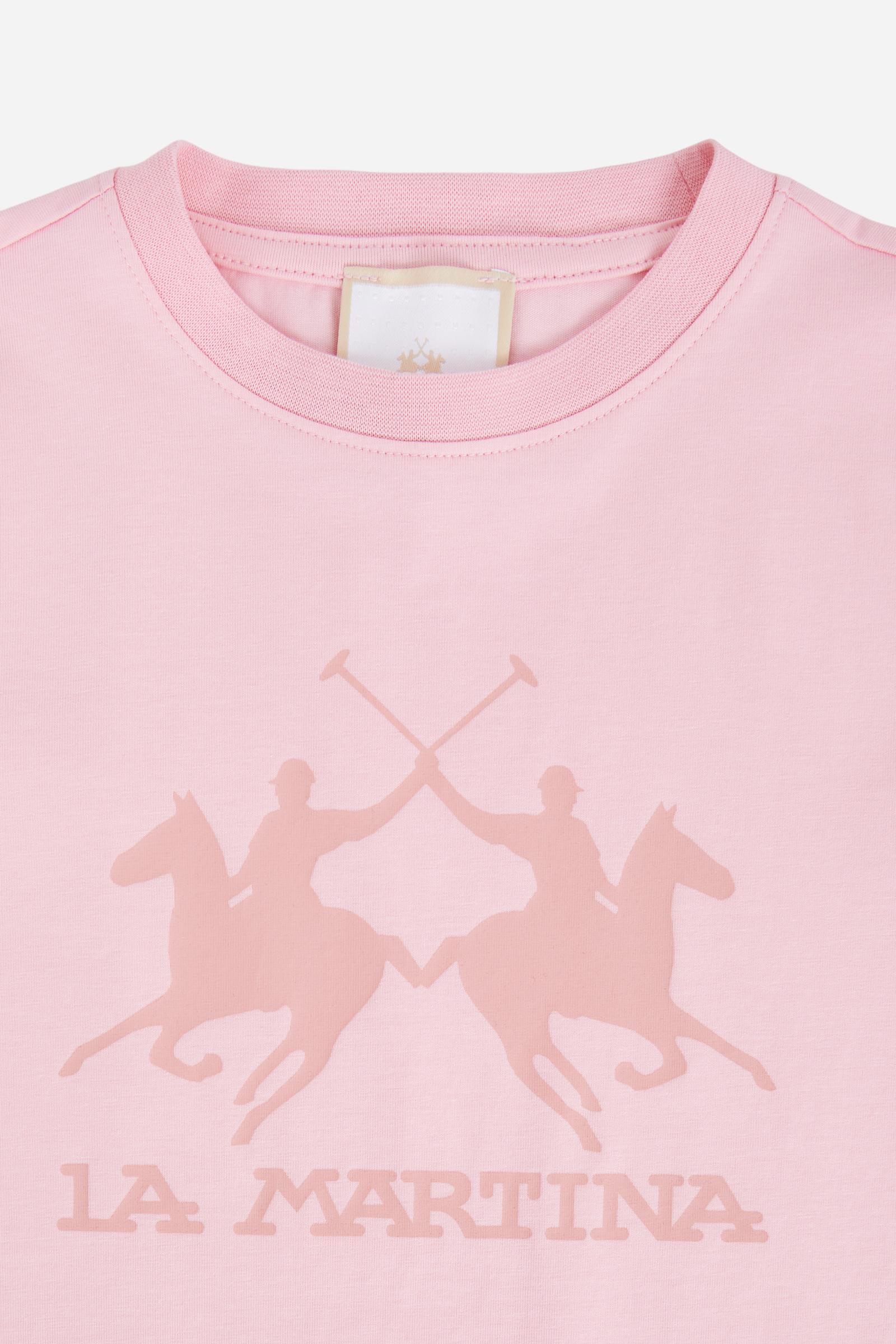 Short-sleeved T-shirt for girls made from soft 100% cotton jersey in a solid colour. The style features a regular fit and tonal ribbed crew neck. The maxi front print, featuring the iconic crossed polo players logo and La Martina lettering, enhances the garment with a sporty and recognisable style. - FairTale