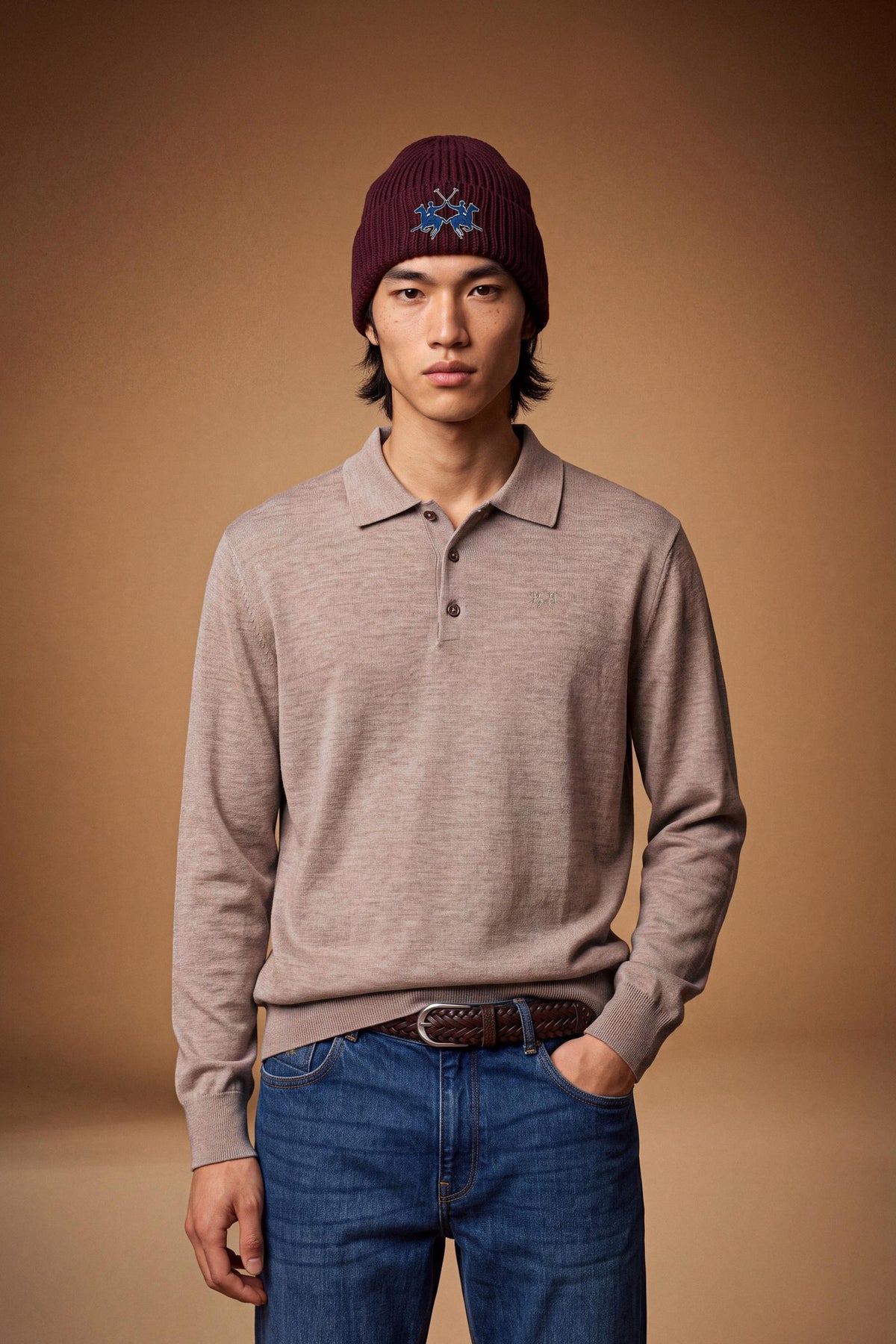 Men's long-sleeve polo made from 100% merino wool offers a comfortable fit, classic knitted collar, ribbed cuffs, and a subtle embroidered logo on the chest. - Vintage Khaki