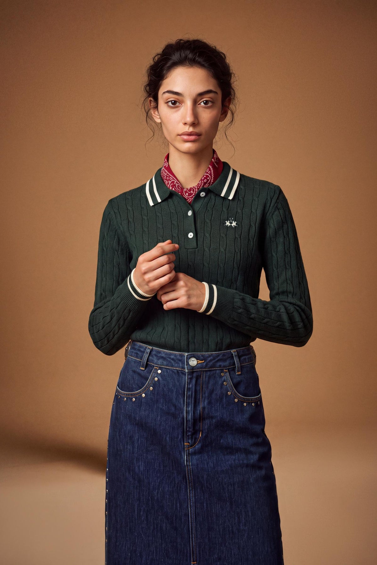 Women's long-sleeve polo in soft lambswool blend, featuring a vertical cable knit, contrast-edged collar, ribbed cuffs, and a slim, comfortable fit. - Scarab