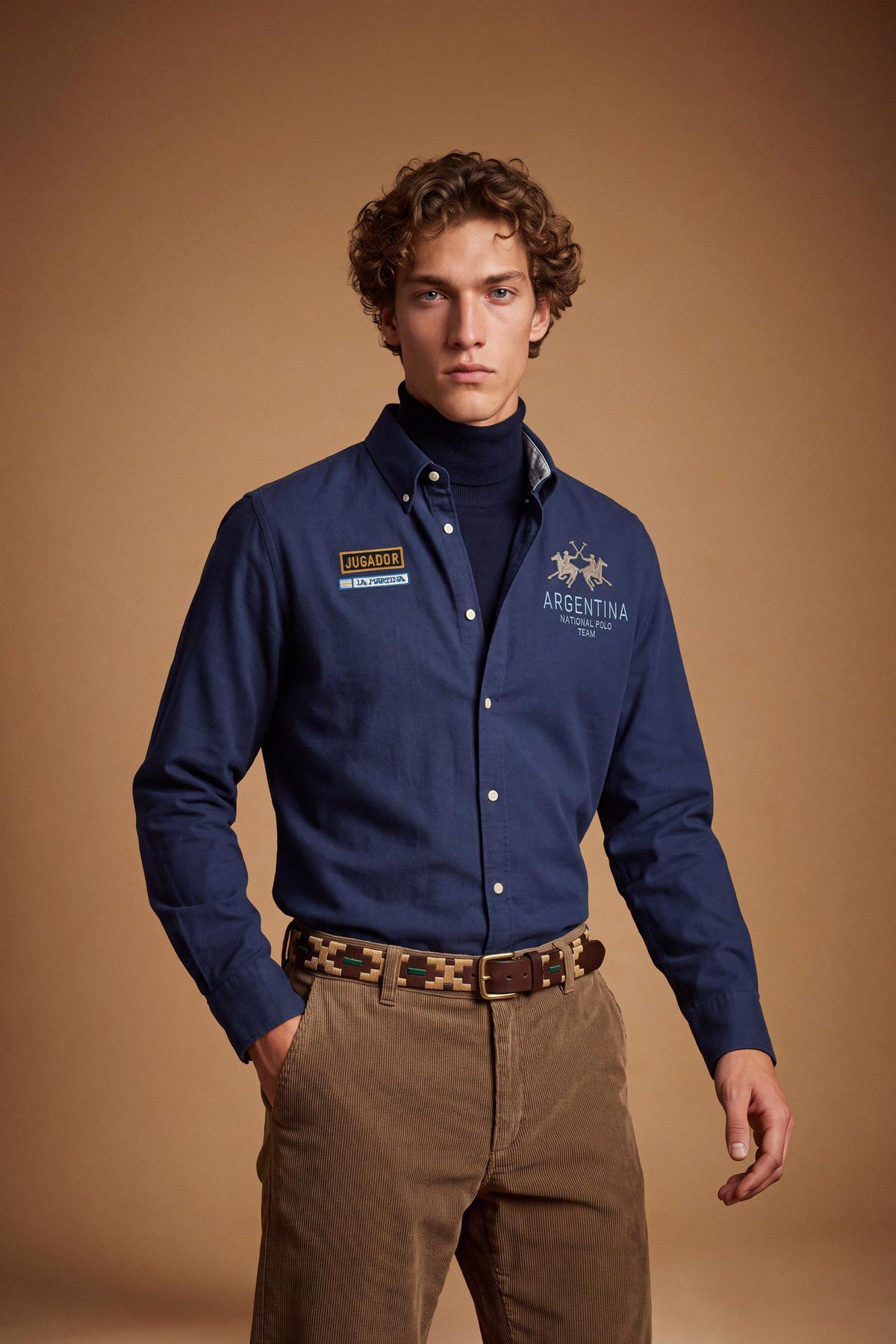 Men’s long-sleeve 100% cotton Oxford shirt with a soft texture, regular tailored fit, button-down collar, mother-of-pearl buttons, and detailed embroidered patches. - Navy