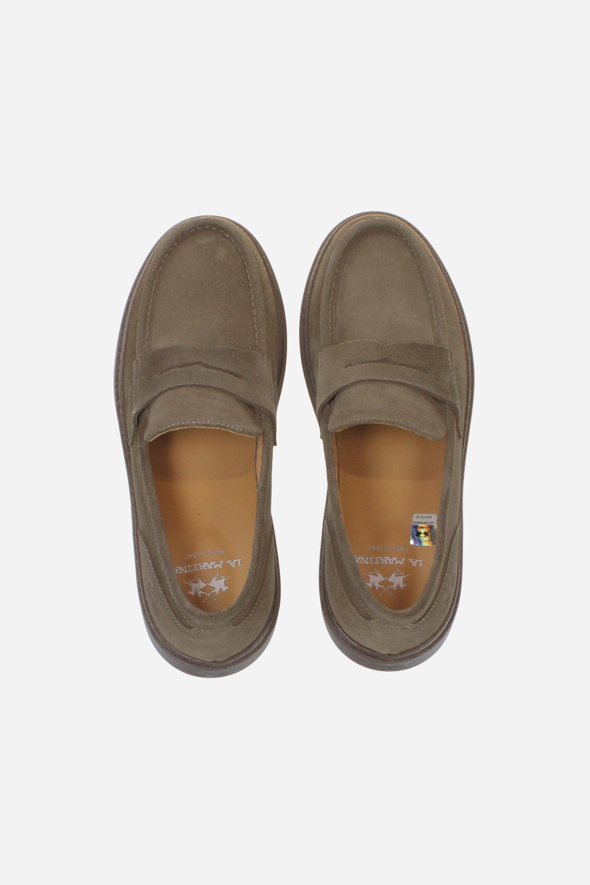 Men's suede loafer with glove stitching, embossed logo, and brown rubber sole for comfort and style. Handcrafted in Italy for casual and semi-formal wear. - Taupe Gray