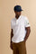 Men’s short-sleeve polo shirt in 100% cotton piqué with contrasting details, ribbed collar, and a unique graphic on the sleeve celebrating the Guards capsule - Optic White                                                                                                                                                                                                                                                                                                                                                     