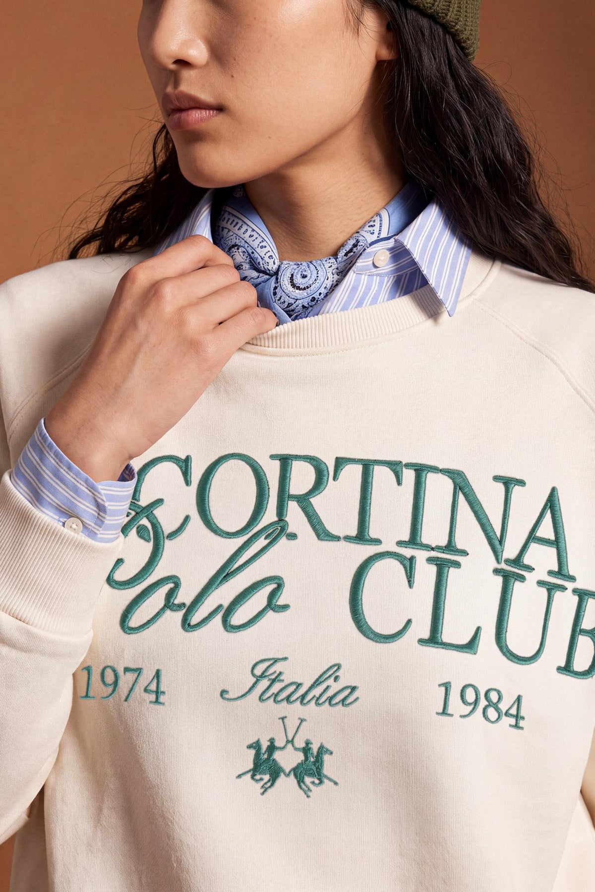 Women's long-sleeve sweatshirt in soft brushed cotton with ribbed crew neck, cuffs, and hem. Relaxed fit with embroidered large Cortina Polo Club logo for style and comfort. - Pristine