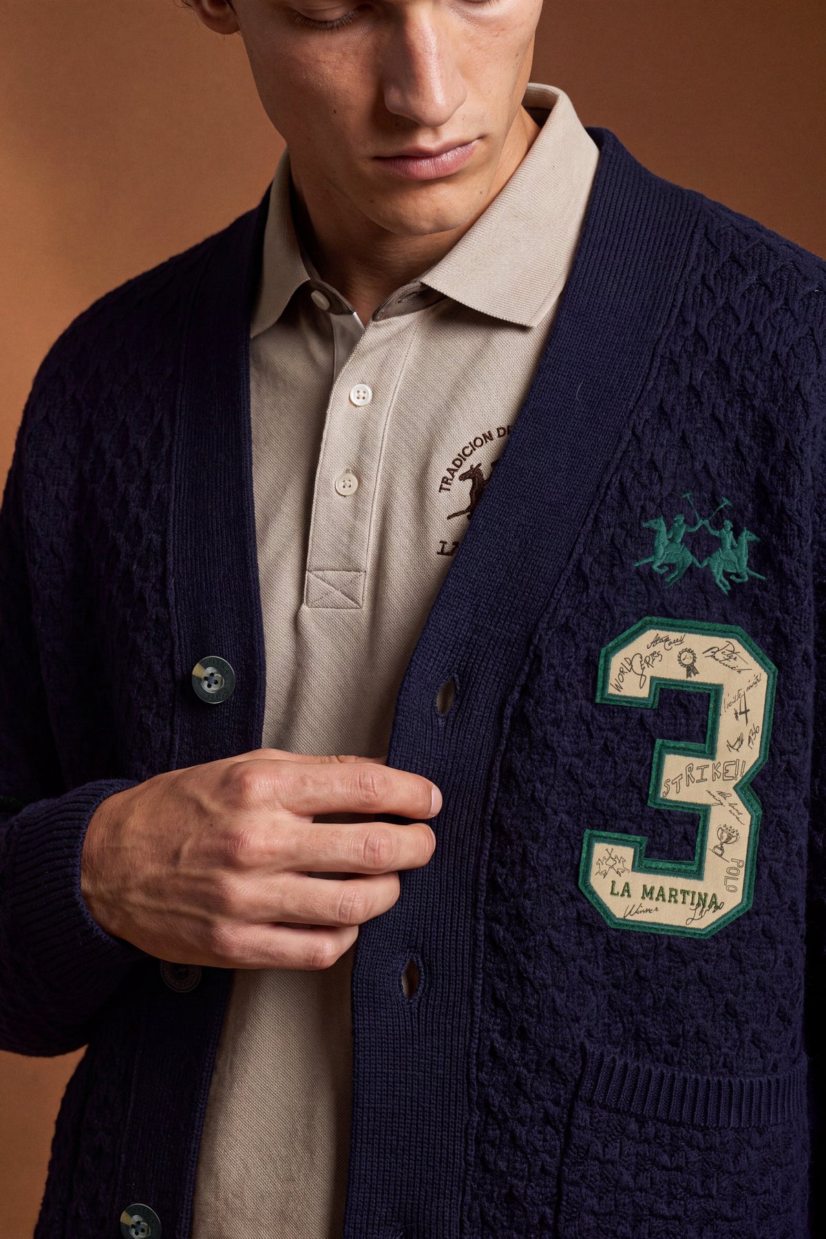 Men's long-sleeve cardigan in 50% lambswool blend with 3D knit, large buttons, patch pockets, bold "3" applique, brand embroidery, and relaxed oversized fit. - Navy