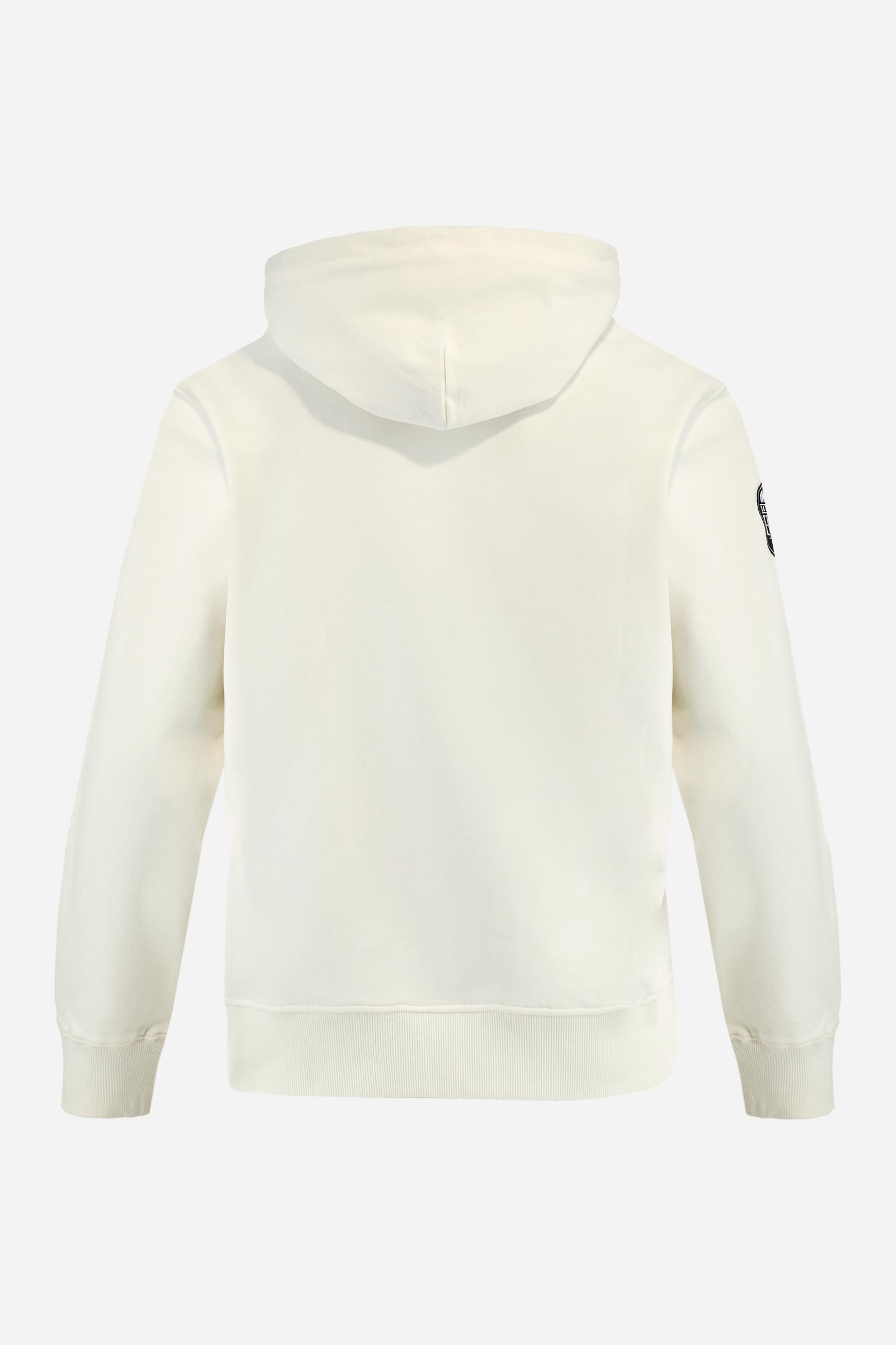 Men's long-sleeved hoodie in solid cotton French terry. Features a large kangaroo pocket, hem and cuffs in tone-on-tone rib. Adjustable hood with contrast lining. Chest and sleeves decorated with modern LM monogram graphics inspired by British polo. Contrasting embroidered logo on the chest. Regular fit for a relaxed and comfortable silhouette. Model wears size L. - Off White