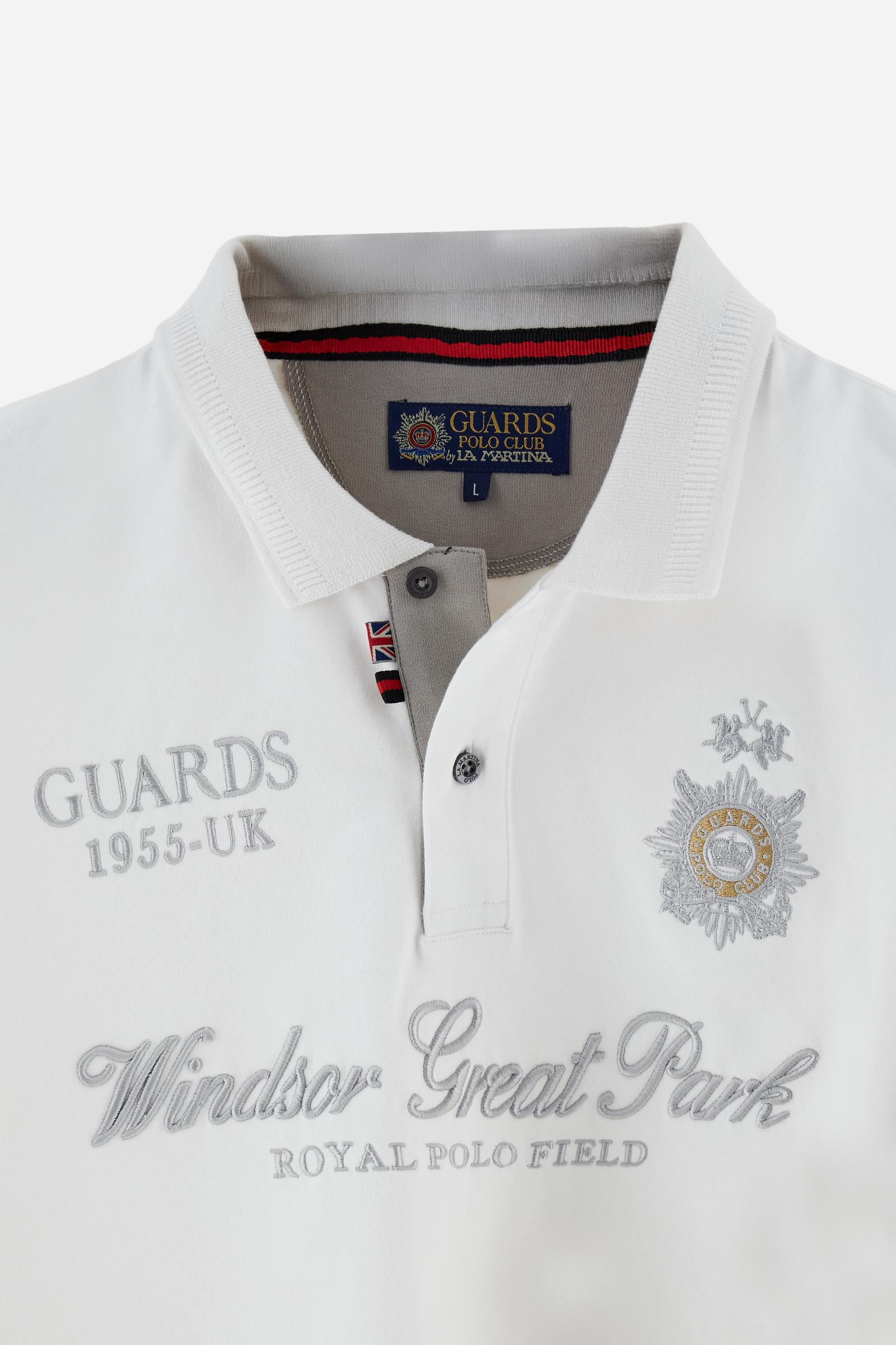 Long-sleeve polo shirt in warm cotton jersey. Ribbed collar with subtle textured detail, contrast undercollar and placket. Logo and Guards crest embroidered in contrast on the chest, paired with raised embroidered lettering inspired by Windsor tradition and British polo. Regular fit for an elegant yet relaxed style. Model wears size L. - Off White