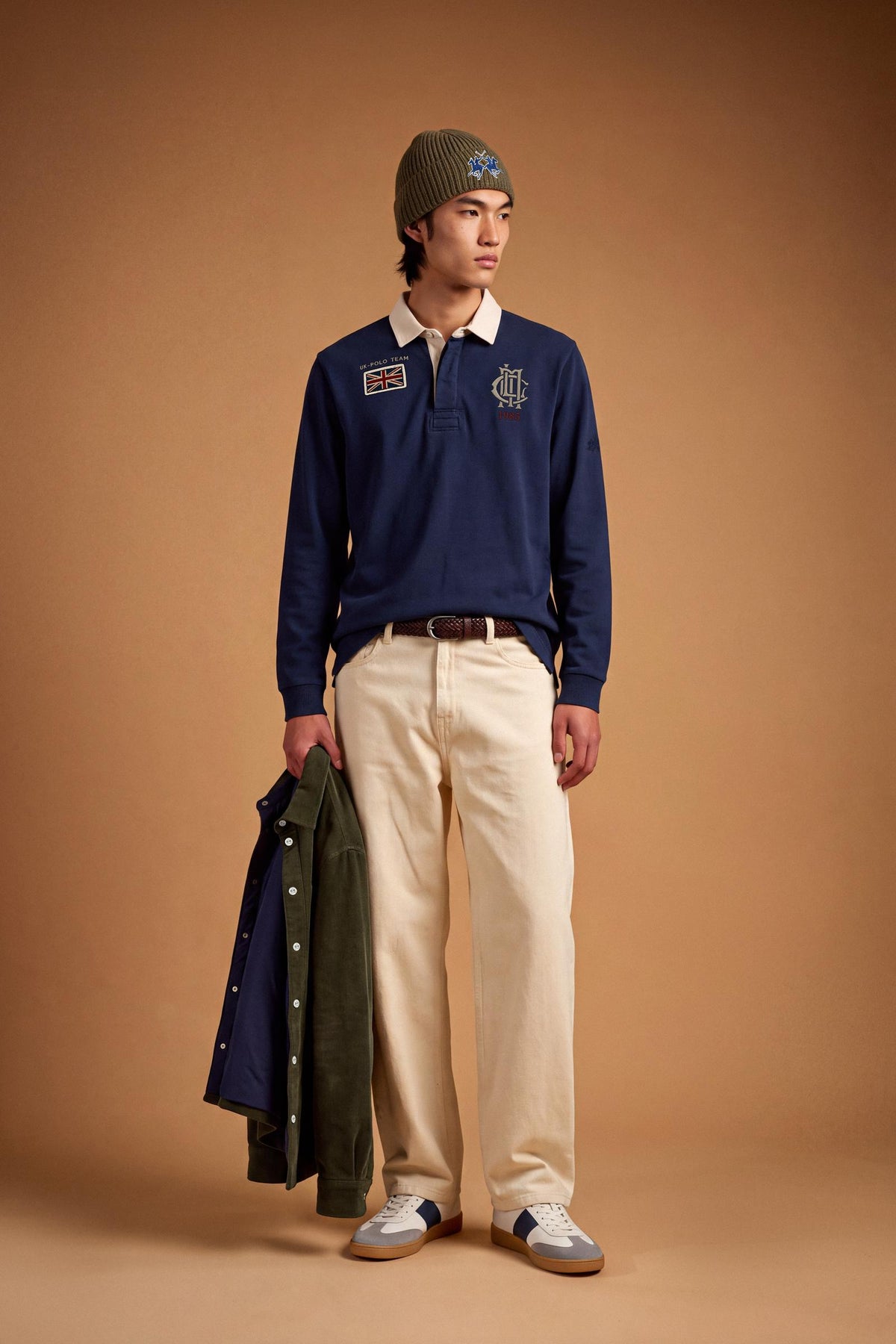 Men’s long-sleeve polo in heavy pure cotton jersey with textured fabric, hidden placket, ribbed cuffs, and heritage British polo graphic for a classic, clean fit. - Navy Blazer