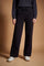 Women's pants in soft brushed cotton with an elastic waistband, adjustable drawstring, vertical side pockets, and a relaxed wide-leg fit for all-day comfort. - Black