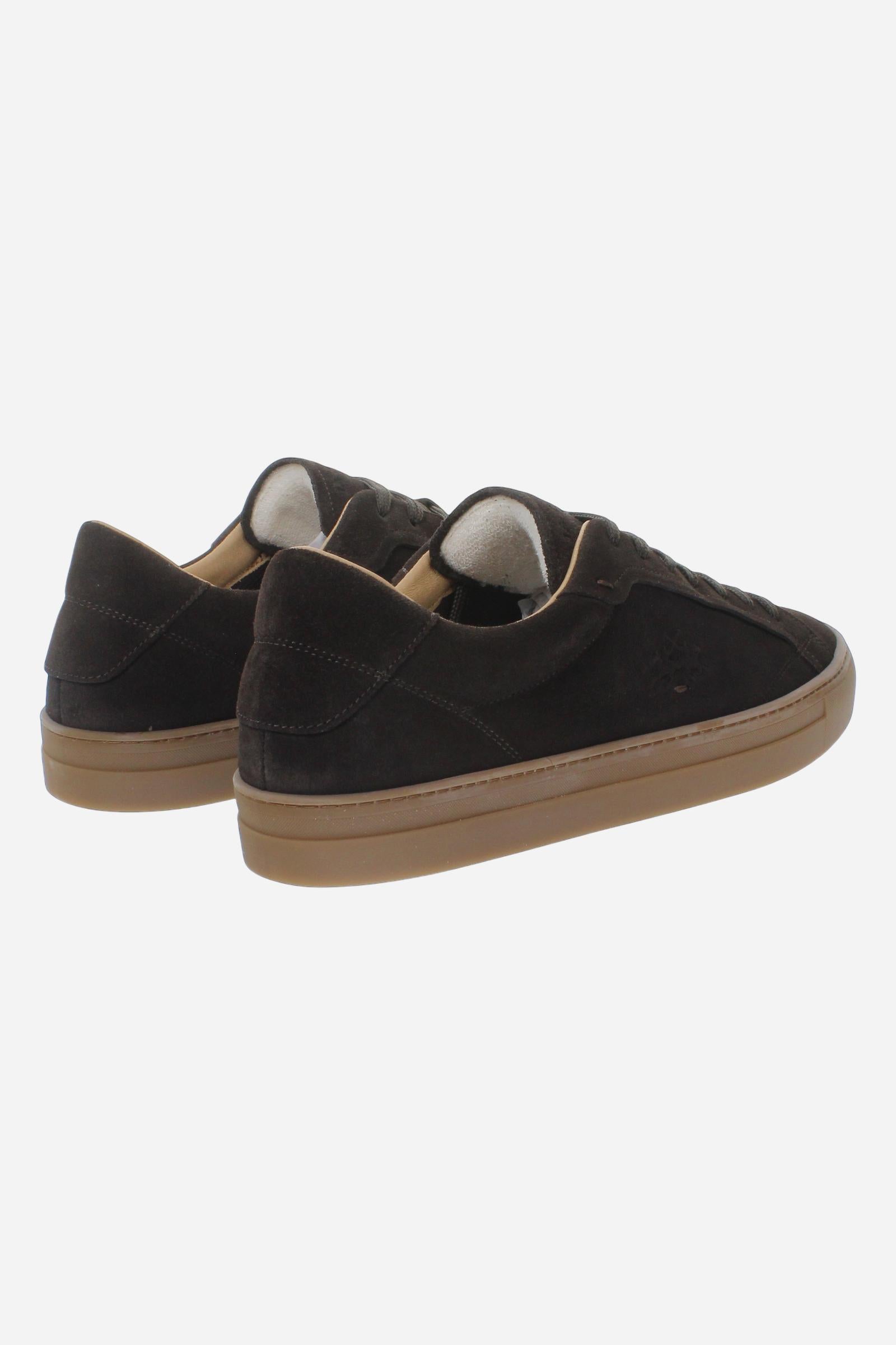 Men’s suede sneaker with flexible two-part leather tongue, hand-stitched embossed logo, amber rubber sole, and lightweight Strobel construction for all-day comfort. - Dark Brown