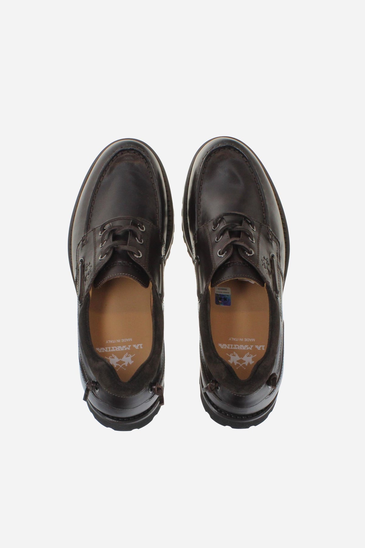 Men's leather boat shoe with handcrafted moccasin stitching, padded nappa collar, leather laces, and Vibram® sole for lightweight comfort, cushioning, and grip. - Dark Brown