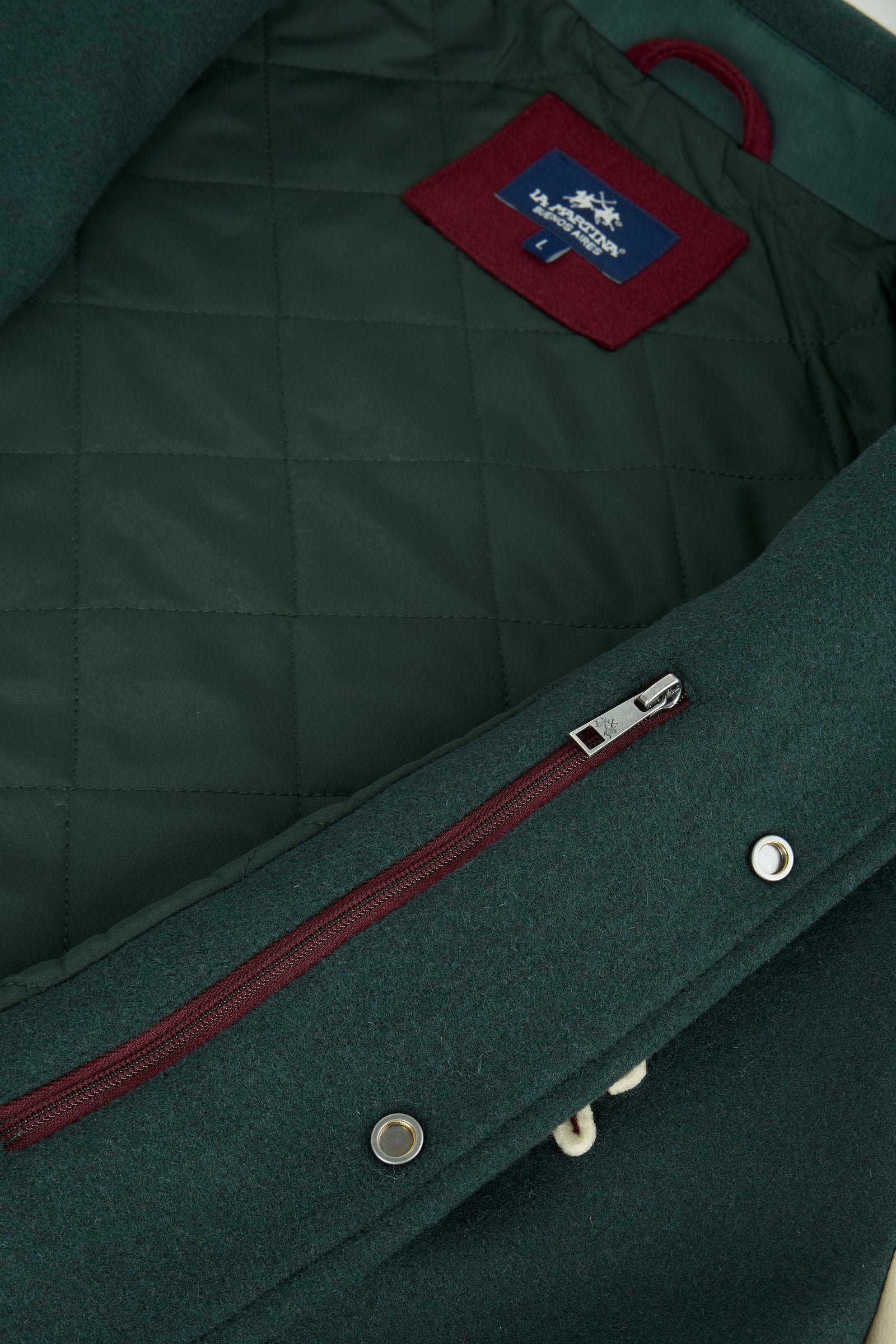 Men's long-sleeve varsity jacket with wool felt body, contrasting faux leather sleeves, ribbed trims, padded lining, chenille patches, and embroidered logo for classic style. - Scarab/Sheer Bliss