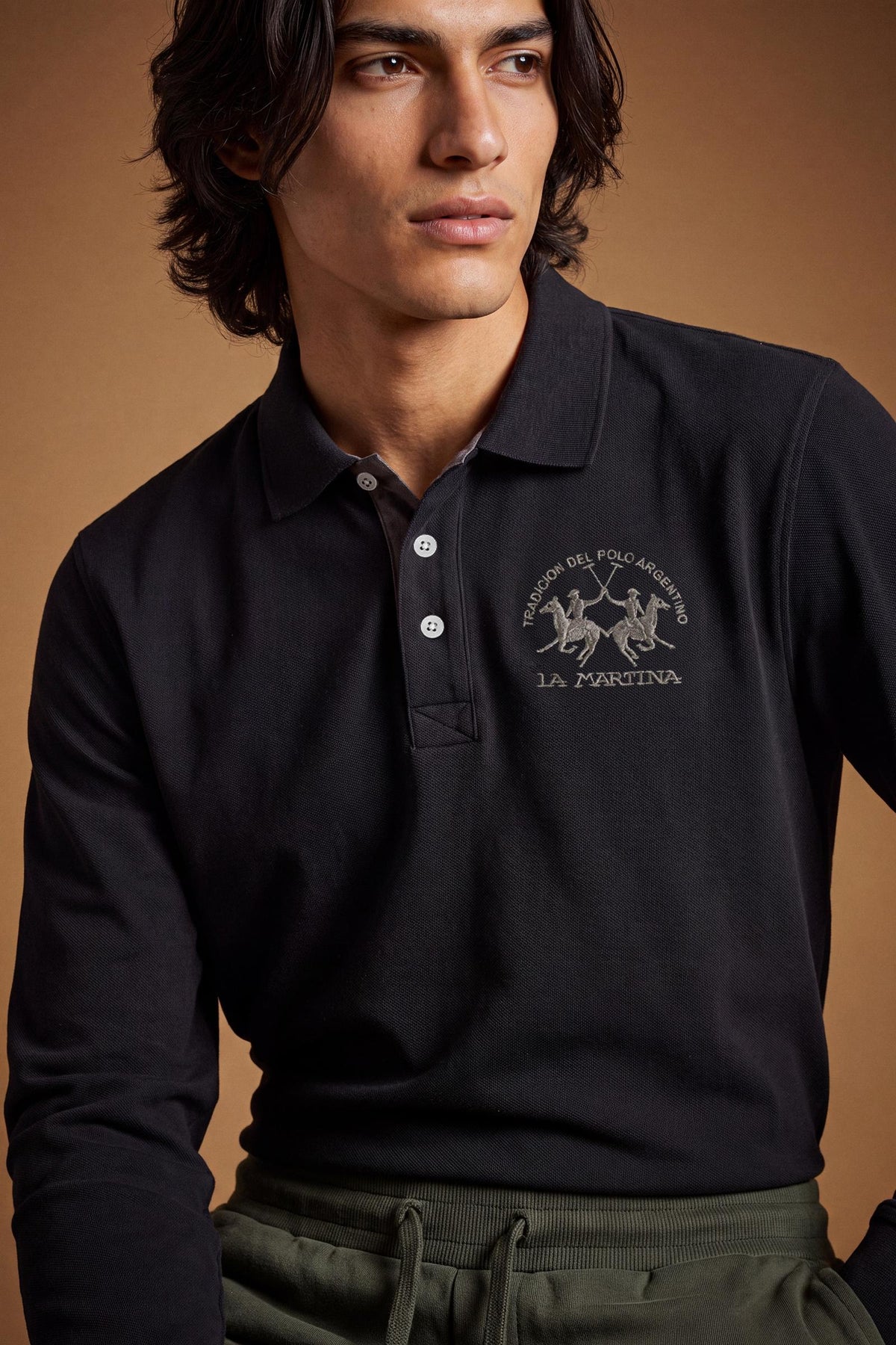 Men's long-sleeve polo in soft cotton jersey with contrasting gabardine collar, ribbed details, multicolor striped placket, and embroidered team logo for comfor - Black