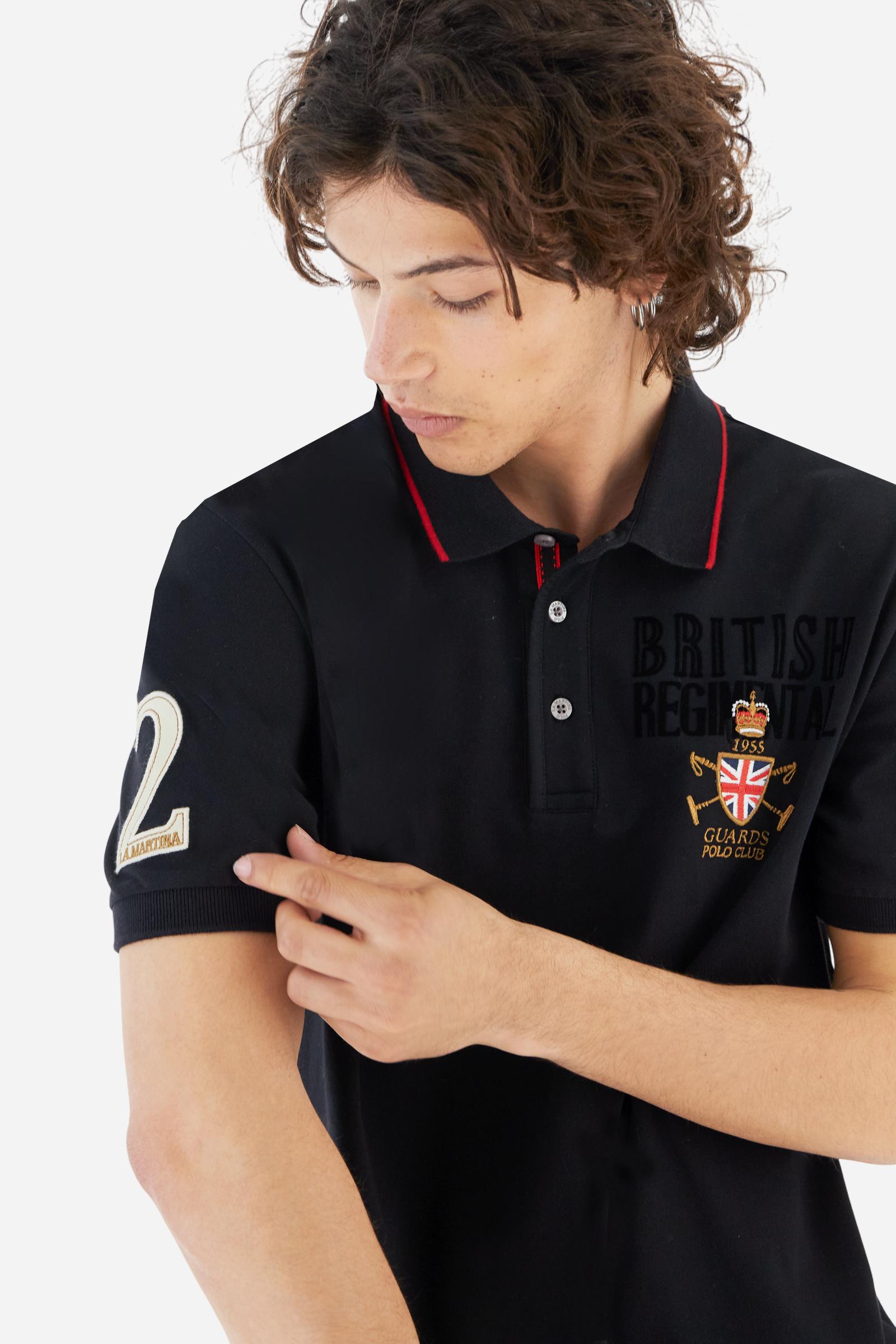 Short-sleeve polo shirt from the Guards capsule, made of high-quality stretch cotton piqué. Ribbed collar and cuffs in matching tone, with contrast striped detail on the collar. Three-button personalized placket. Multicolor graphics, patches, and lettering celebrate the British regiment, applied to chest and sleeves. Brand logo embroidered in contrast on the left sleeve. Regular straight fit. Model wears size L. - Black