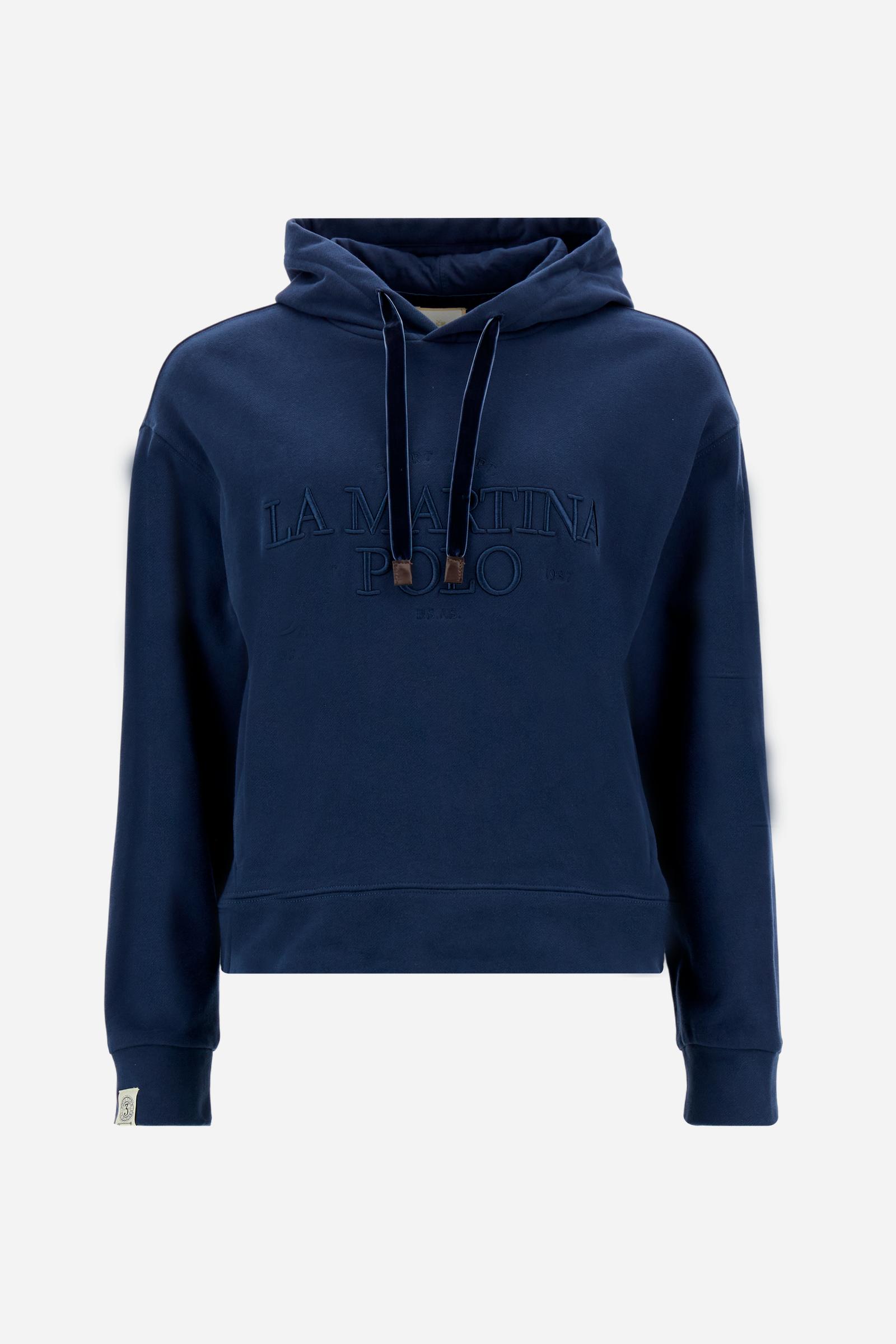 Women’s hoodie with long sleeves in 100% cotton french terry, solid colour with a velvety and warm touch. The hood is lined in tone-on-tone jersey and finished with a velvet drawstring. The chest graphic recalls the refined aesthetics of the Royal Polo theme, while the small brand logo is tone-on-tone embroidered on the sleeve. The model wears size L. - Navy