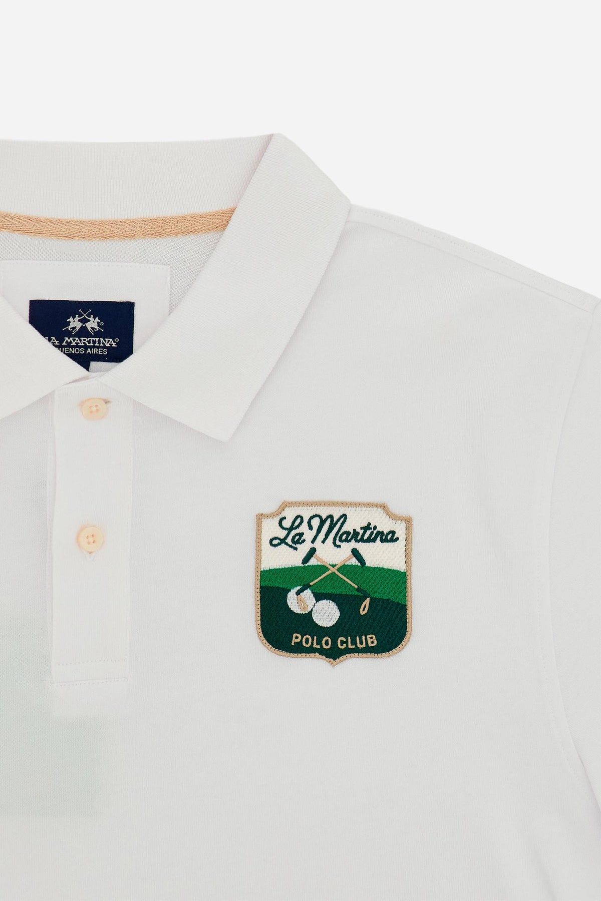 Men’s short-sleeve polo in 100% cotton piqué with a two-button placket, ribbed collar, and embroidered details for a contemporary fit. - Optic White
