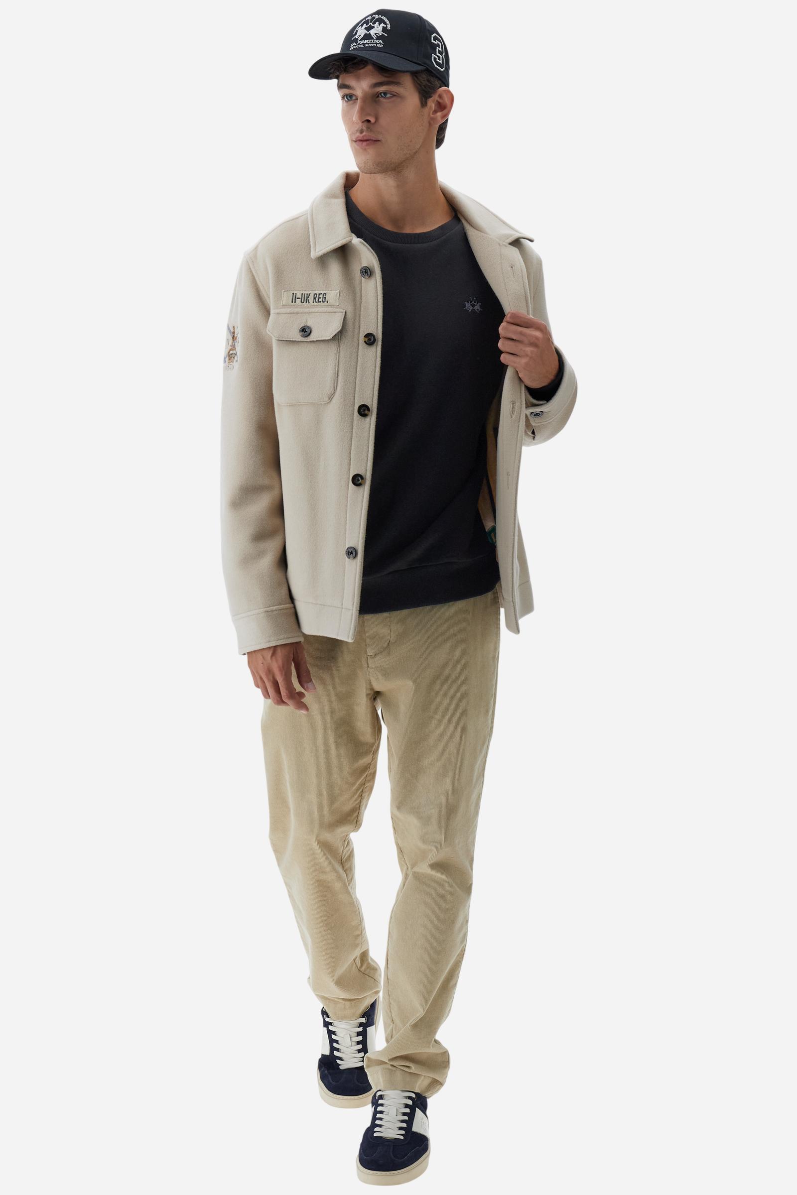 Men's long-sleeved round neck sweatshirt in 100% cotton fleece with a velvety feel. The collar, cuffs, waist and sides are in matching ribbed knit. The small brand logo is embroidered in contrasting colour on the chest. This essential piece has a regular fit for a timeless silhouette. The model is wearing a size L - Black