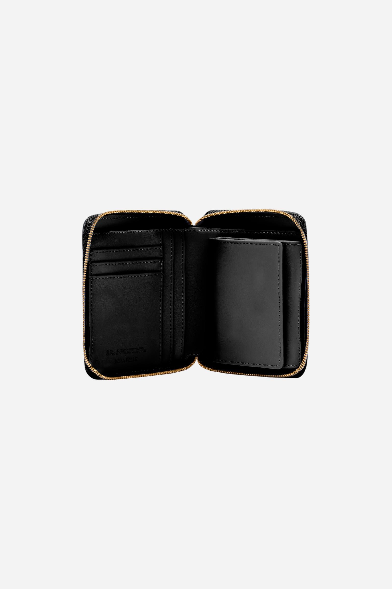 Small zip around wallet in calfskin leather. Compact and practical, with golden zip and branded metal detail. - Black