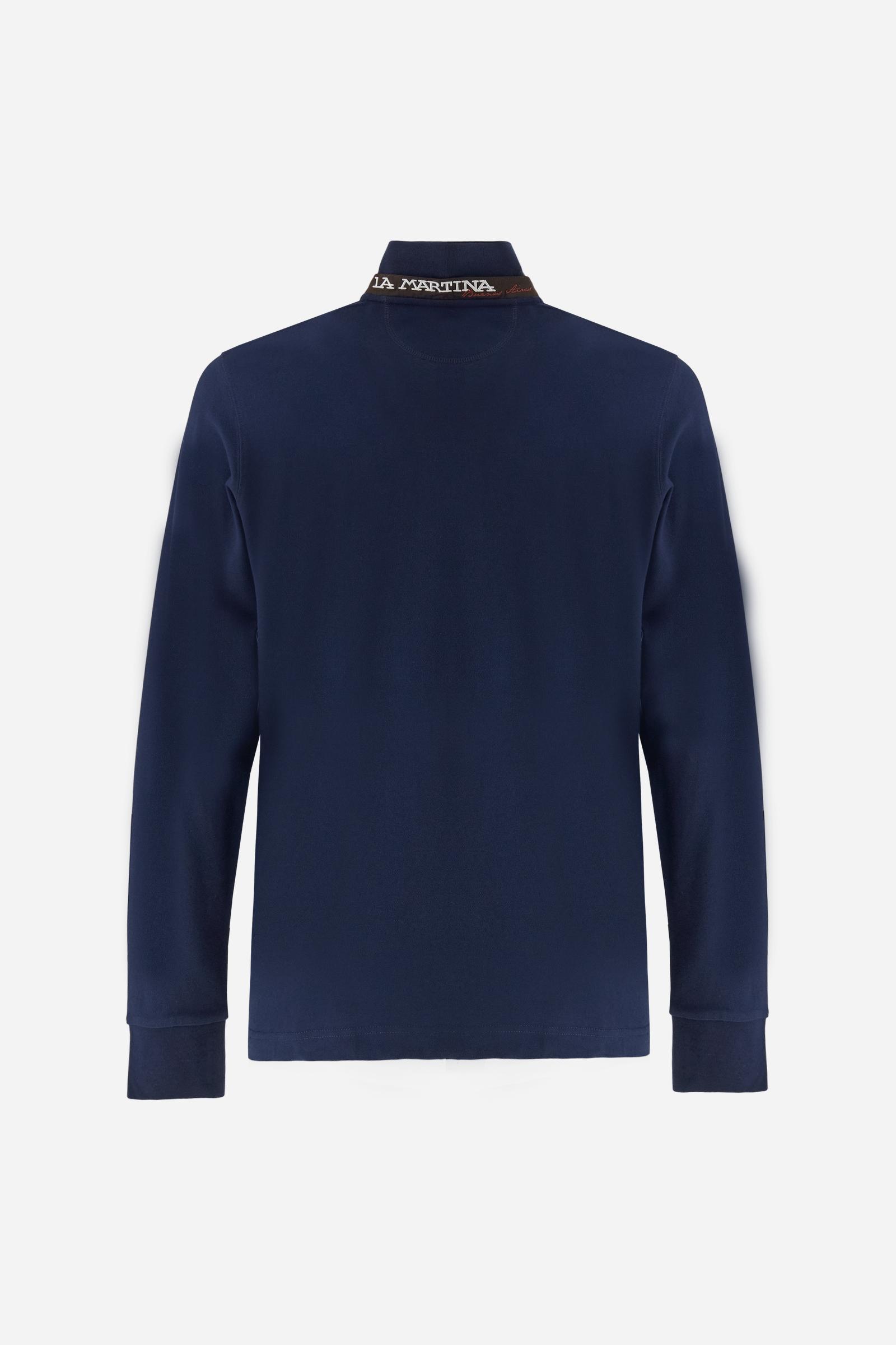 Men’s long-sleeve polo in high-quality stretch cotton piqué for comfort and flexibility. Tone-on-tone ribbed collar with contrast gabardine undercollar embroidered with the brand’s iconic lettering, revealed when the collar is lifted. Contrast embroidered logo on the chest. Slim fit, offering a modern silhouette that enhances the body while ensuring freedom of movement. Model wears size L. - Navy