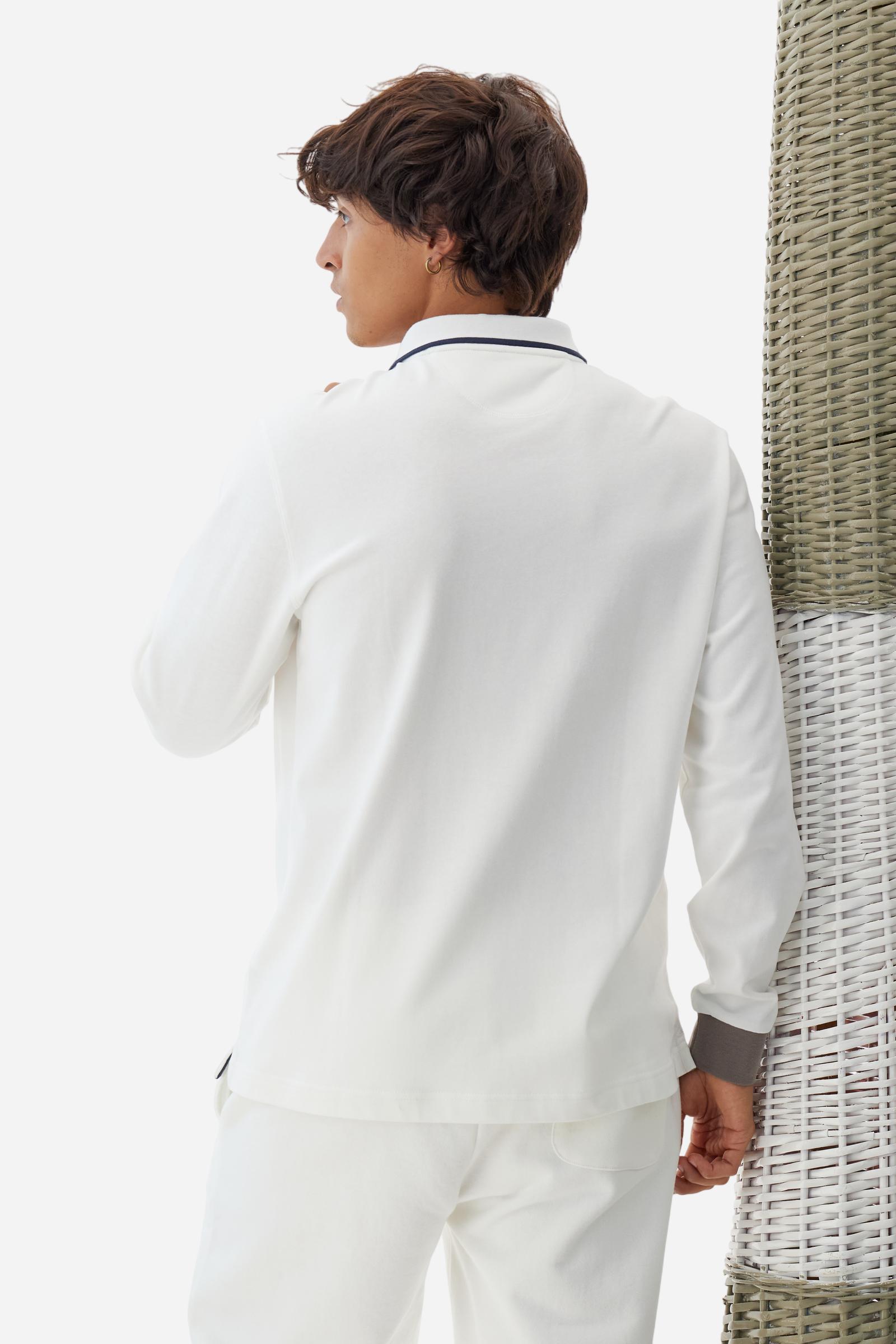 Men’s long-sleeve polo shirt in solid-colour cotton jersey with a warm, matte handfeel. Ribbed collar and cuffs with stripes and colour blocks in contrast, two personalised buttons and contrast details inside the collar. Patches and graphics on sleeves and chest celebrate the Official Polo Supplier team. The large multicolour logo is embroidered on the chest. Regular fit. The model wears size L. - Off White