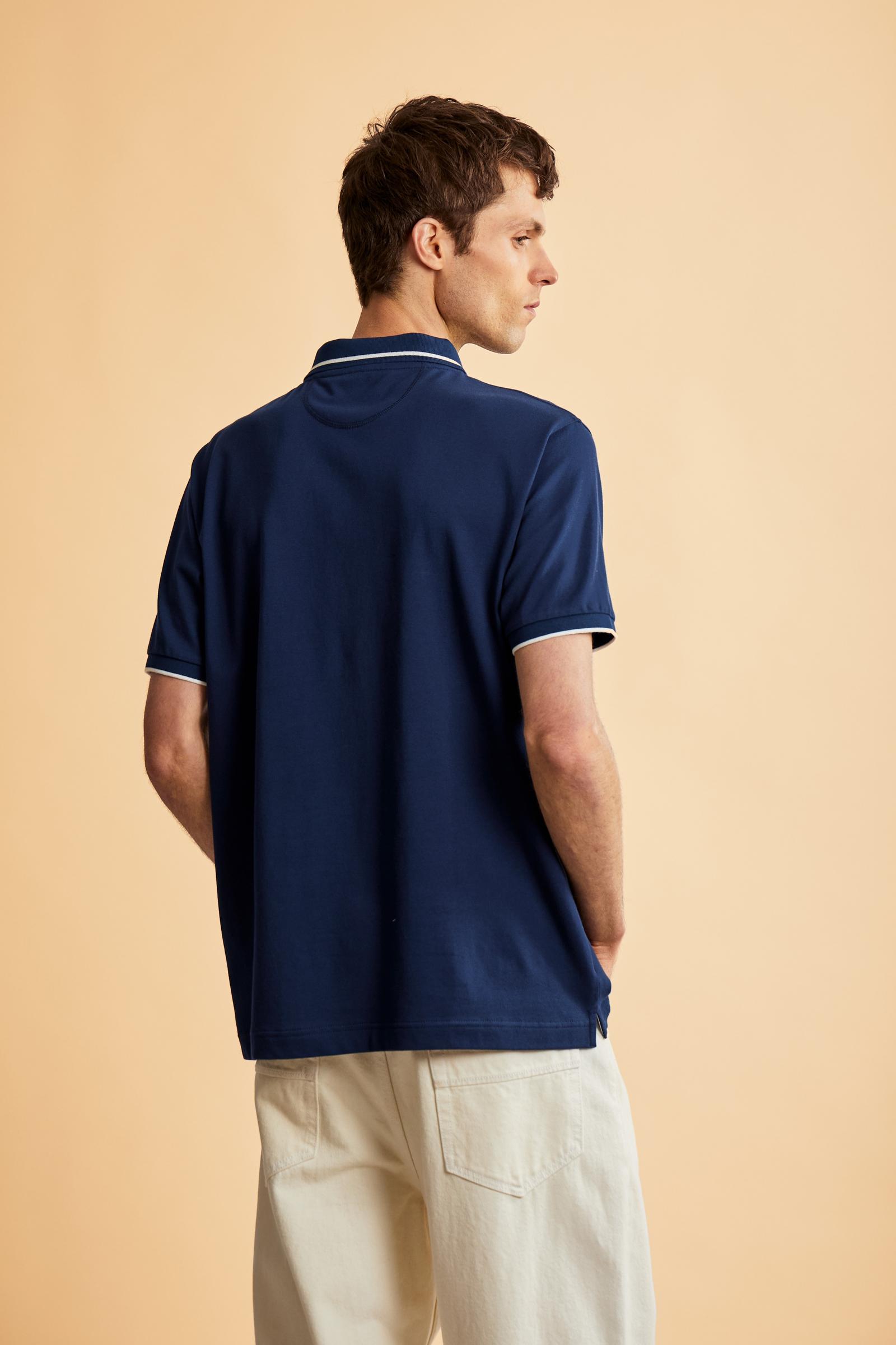 Men's short-sleeve polo in stretch piqué fabric with ribbed details, embroidered logo, bold lettering, and a relaxed regular fit for versatile comfort. - Navy