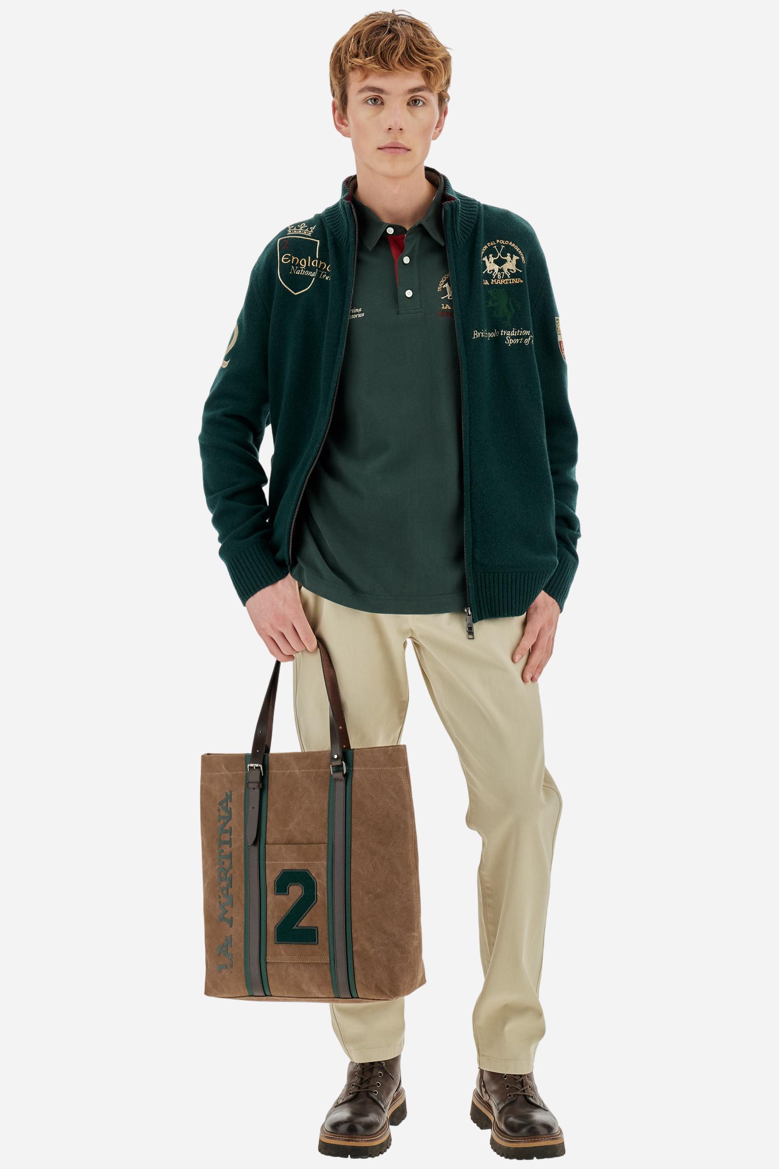 Long-sleeve polo shirt in 100% cotton jersey, soft and warm to the touch. Gabardine collar in tone with a contrast placket for a modern look. The English flag is printed under the raised right collar tip. Contrasting fabric bands and a patch with number 2 decorate the right sleeve, evoking polo player uniforms. Multicolor graphics dedicated to the English team and past special events enrich the design, with a large team logo embroidered in two-tone on the chest. Regular fit. Model wears size L. - Sycamore