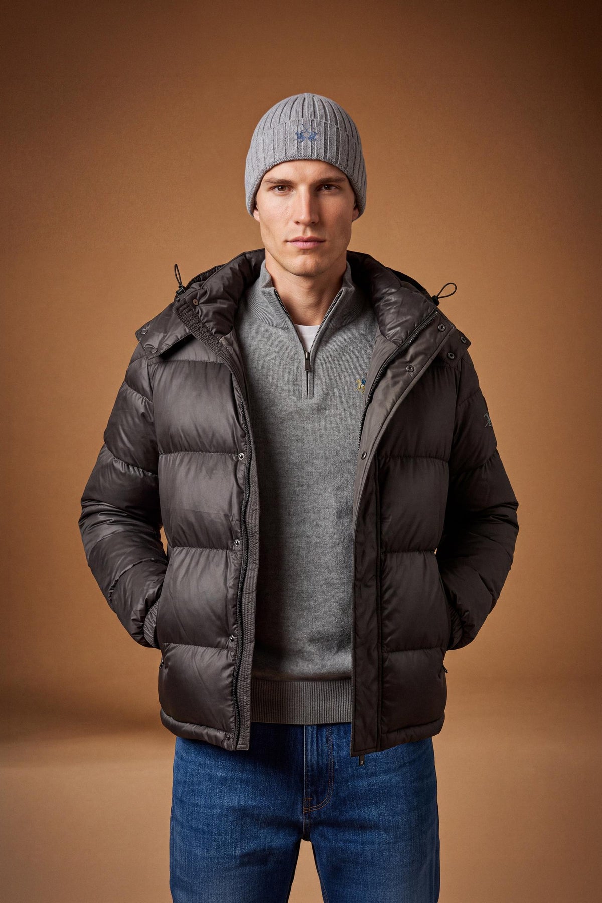 Men's padded feather bomber jacket with detachable hood, iridescent nylon, double zipper, snap buttons, adjustable drawstring, zippered pockets, and embroidered logo. - Black