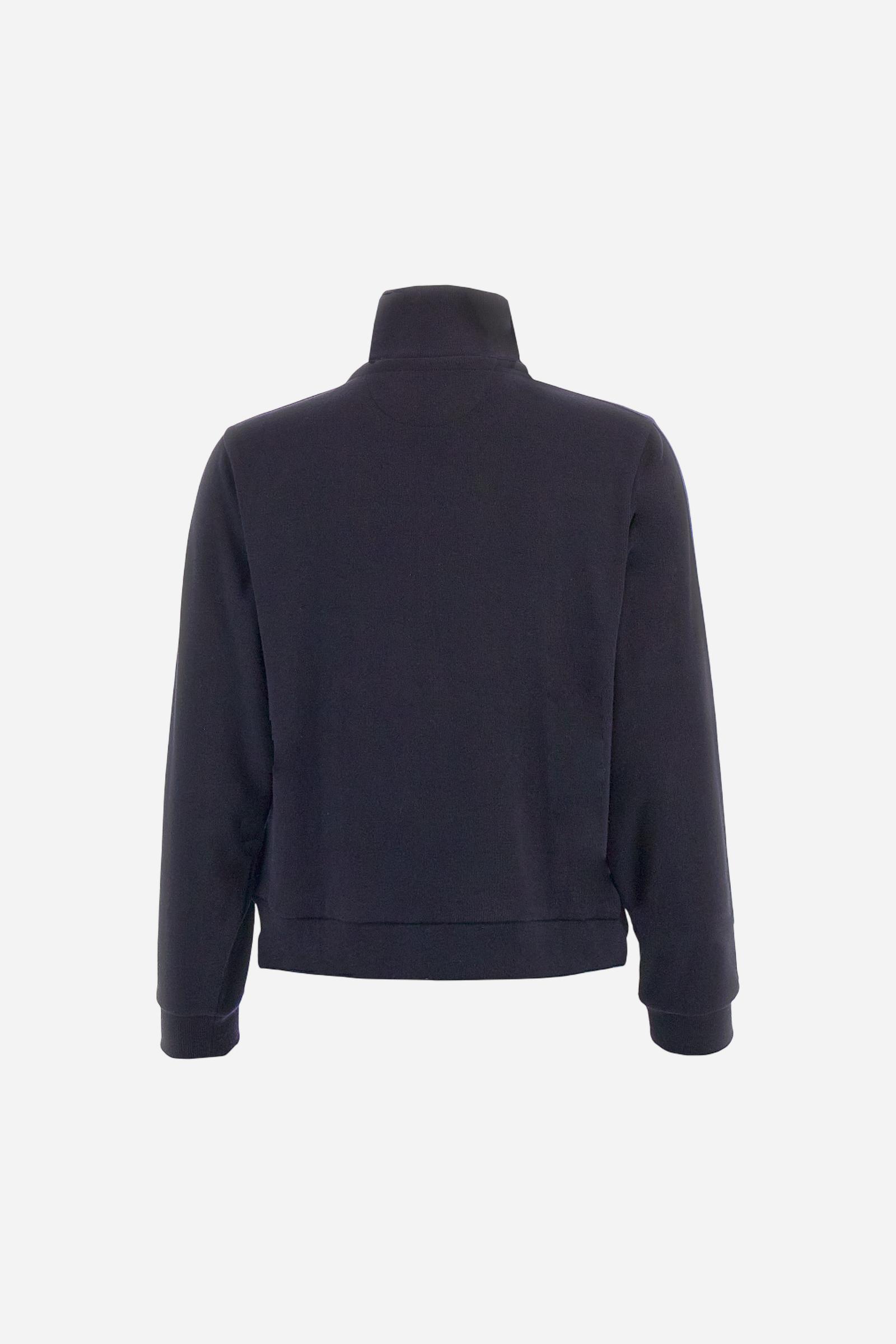 Women’s full-zip sweatshirt with long sleeves in soft interlock viscose blend, offering a luxurious feel on the skin. Straight cut with fluid line and sport-luxury details. Striped bands on the sleeves and heraldic embroidery on the chest add a contemporary touch. The model wears size 2. - Navy