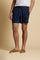 Men’s solid nylon mid-length swim shorts. Regular fit with elasticated waistband, adjustable drawstring, back pocket and embroidered logo. - Navy                                                                                                                                                                                                                                                                                                                                                                               