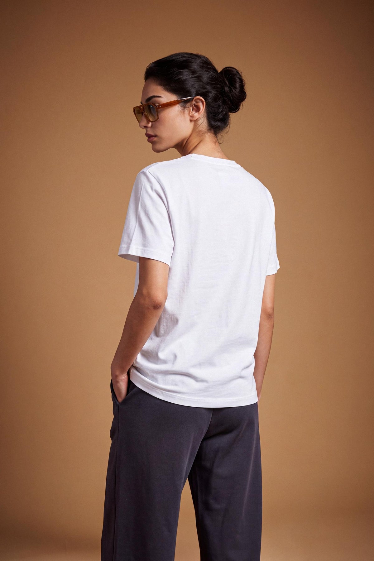 Women's short-sleeve T-shirt in 100% cotton jersey, offering a smooth feel, regular fit with subtle shaping, round neckline, and a small embroidered logo on the chest. - Optic White