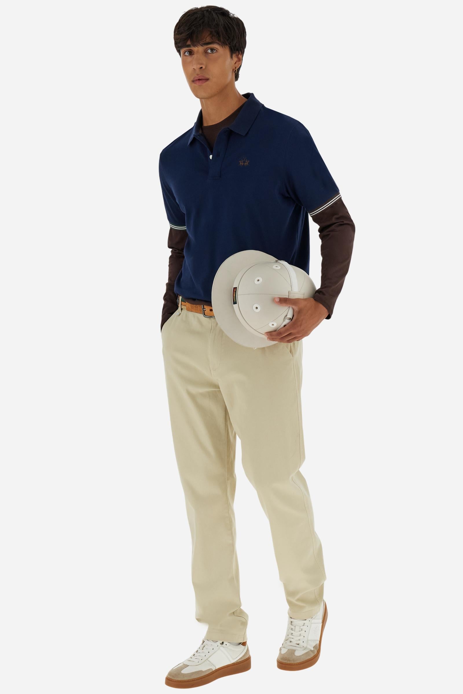 Men’s short-sleeve polo in high-quality stretch cotton piqué, ensuring excellent breathability and flexibility. Classic ribbed collar, two-button placket with customized buttons. Inner collar enriched with contrast tapes and colors for a modern touch. Multicolored ribbed cuffs with different patterns. Small contrast logo embroidered on the chest. Regular fit. Model wears size L. - Navy