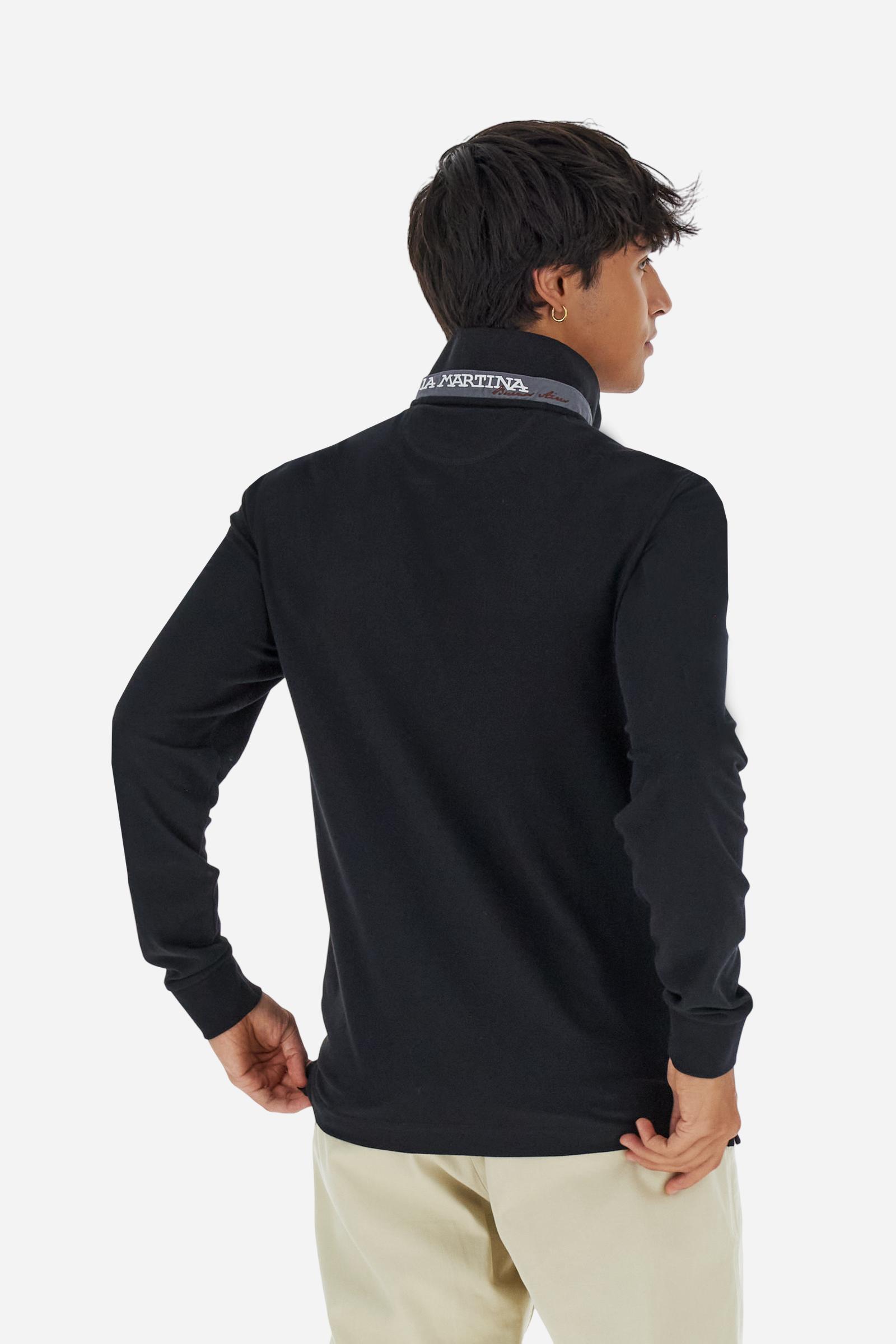 Men’s long-sleeve polo in high-quality stretch cotton piqué for comfort and flexibility. Tone-on-tone ribbed collar with contrast gabardine undercollar embroidered with the brand’s iconic lettering, revealed when the collar is lifted. Contrast embroidered logo on the chest. Slim fit, offering a modern silhouette that enhances the body while ensuring freedom of movement. Model wears size L. - Black