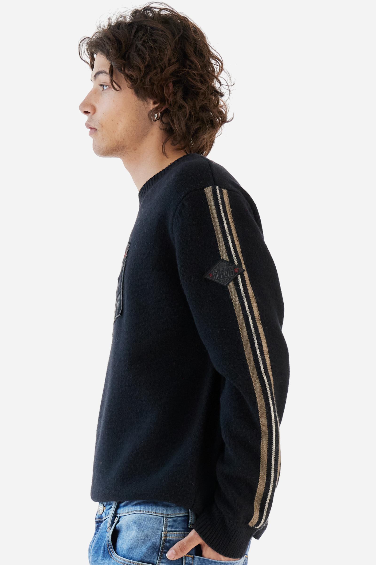 Full-zip men’s sweater in lambswool blend, soft and resistant. Ribbed collar, cuffs, and hem in matching tone. Multicolor striped knitted bands run along the sleeves. A large embroidered patch dedicated to Argentina dominates the chest, complemented by additional embroidered patches on the left sleeve. Relaxed, comfortable fit for distinctive everyday style. Model wears size L. - Black