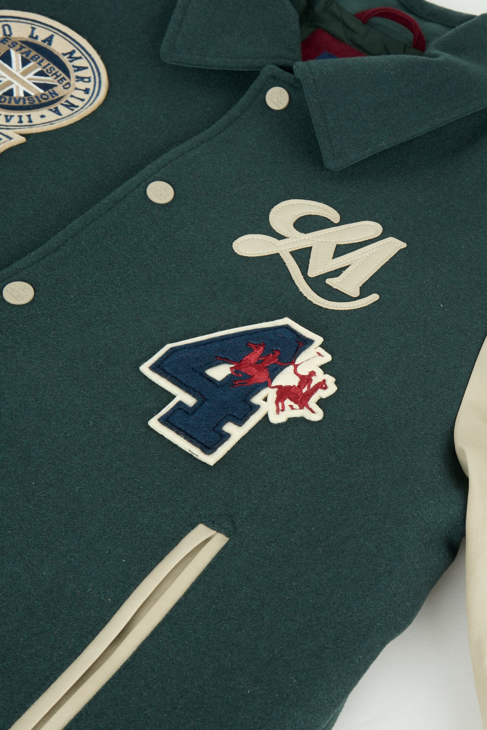 Men's long-sleeve varsity jacket with wool felt body, contrasting faux leather sleeves, ribbed trims, padded lining, chenille patches, and embroidered logo for classic style. - Scarab/Sheer Bliss
