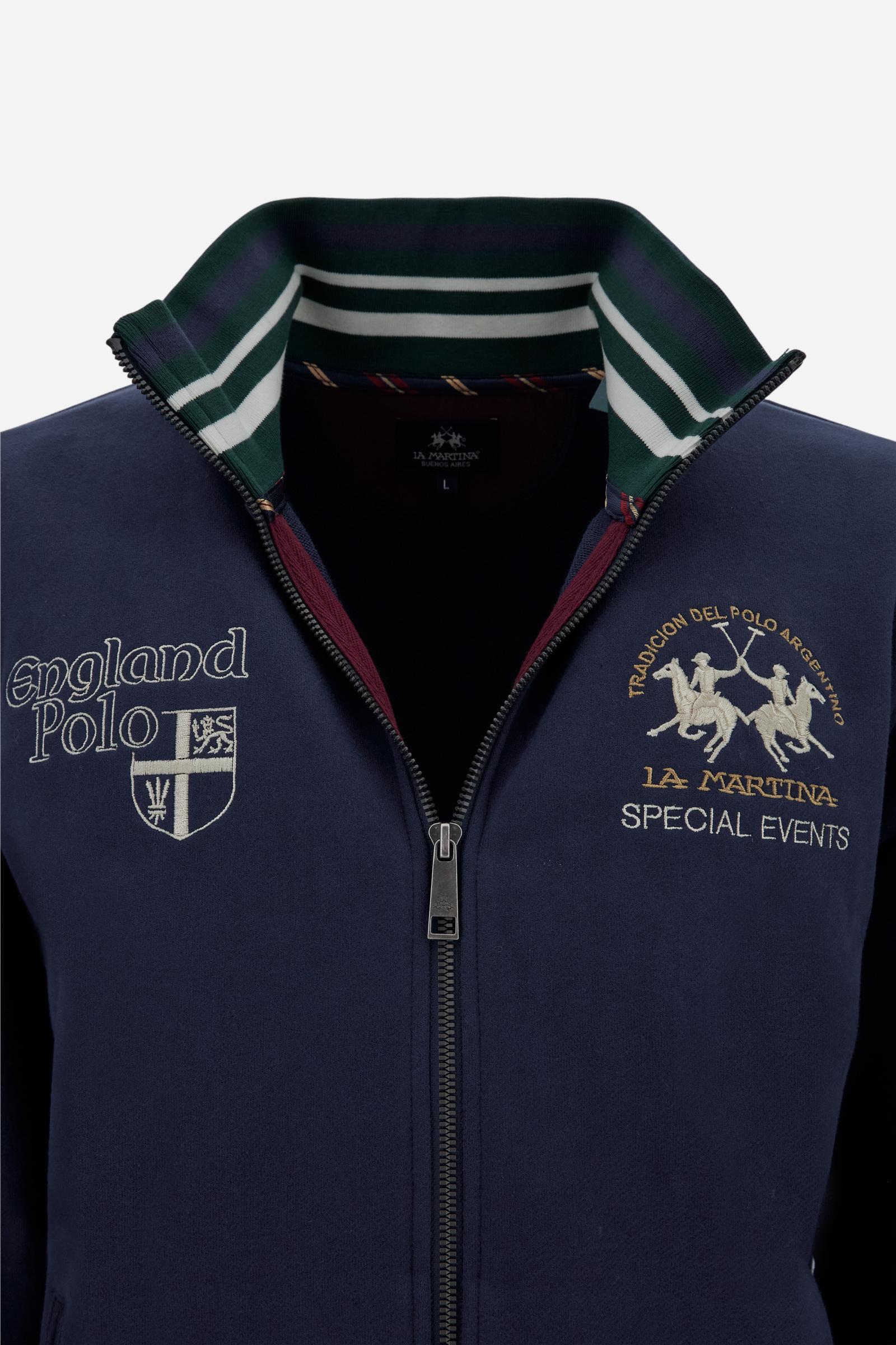 Men's long-sleeved sweatshirt in solid cotton with customised front zip. Contrast rib cuffs and inner collar with multicolour stripe add character. Chest and sleeve decorated with graphics dedicated to the English polo team, large embroidered team logo on the chest. Regular fit providing comfort and functionality. Model wears size L. - Navy