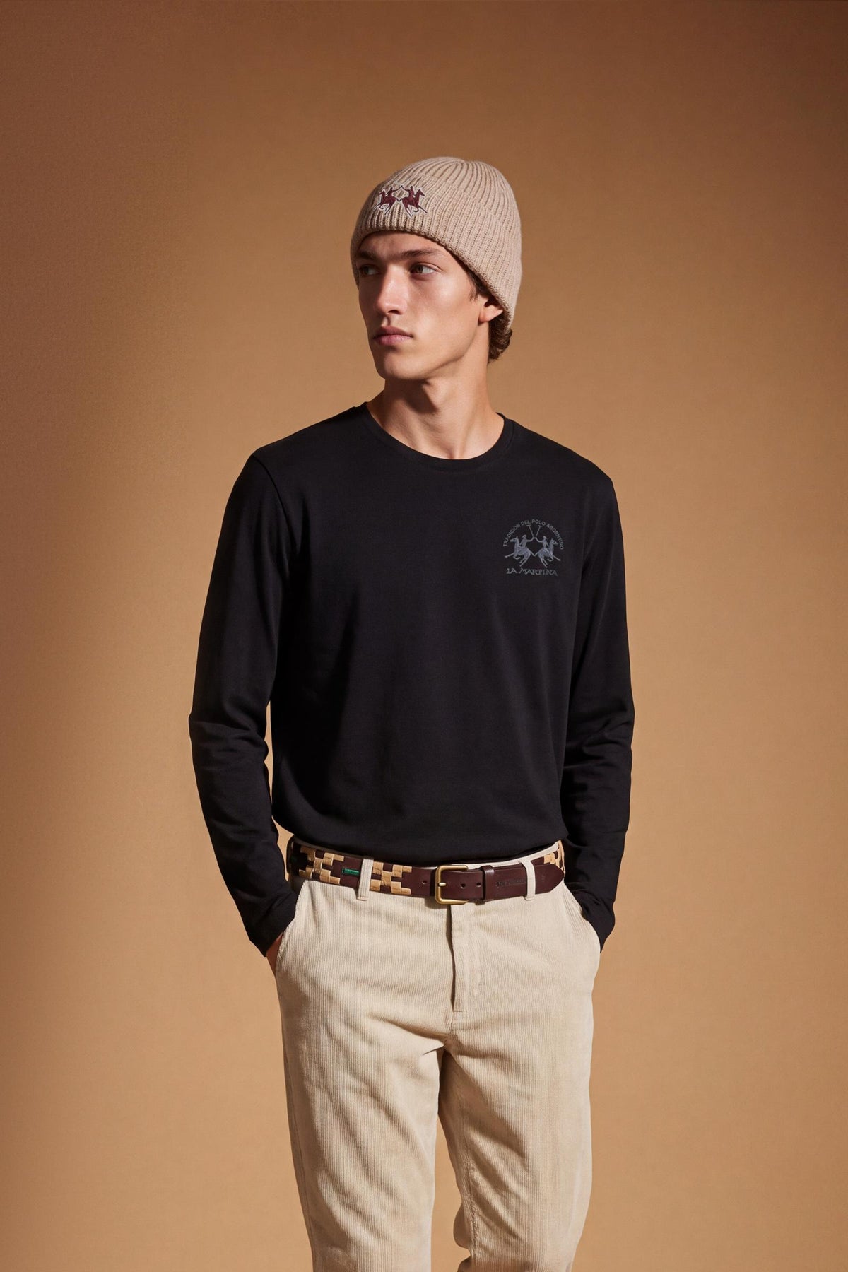 Long-sleeve 100% cotton jersey T-shirt with ribbed crew neck and cuffs, featuring a contrasting embroidered team logo. Regular fit for all-day comfort. - Black