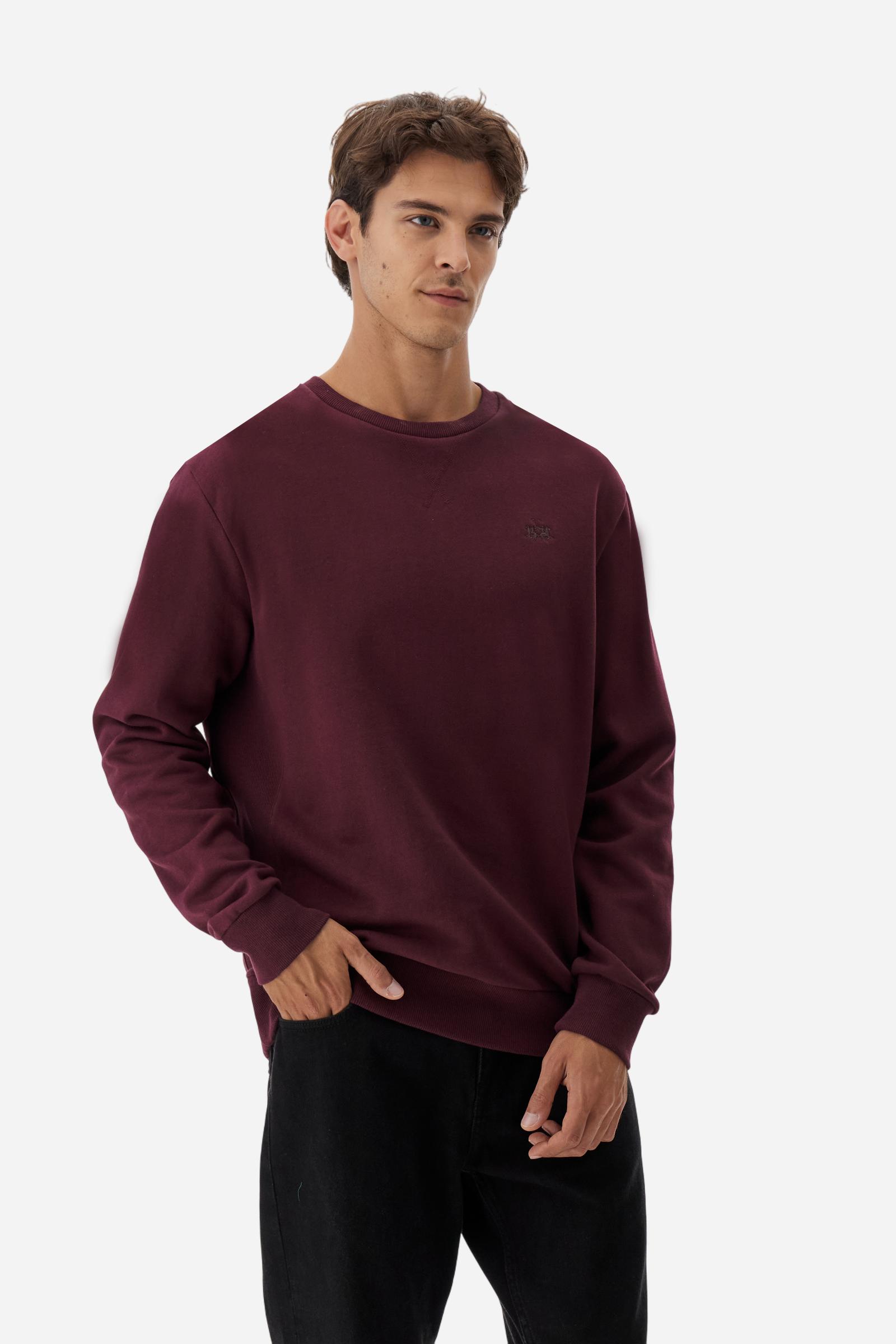 Men's long-sleeved round neck sweatshirt in 100% cotton fleece with a velvety feel. The collar, cuffs, waist and sides are in matching ribbed knit. The small brand logo is embroidered in contrasting colour on the chest. This essential piece has a regular fit for a timeless silhouette. The model is wearing a size L - Port Royale