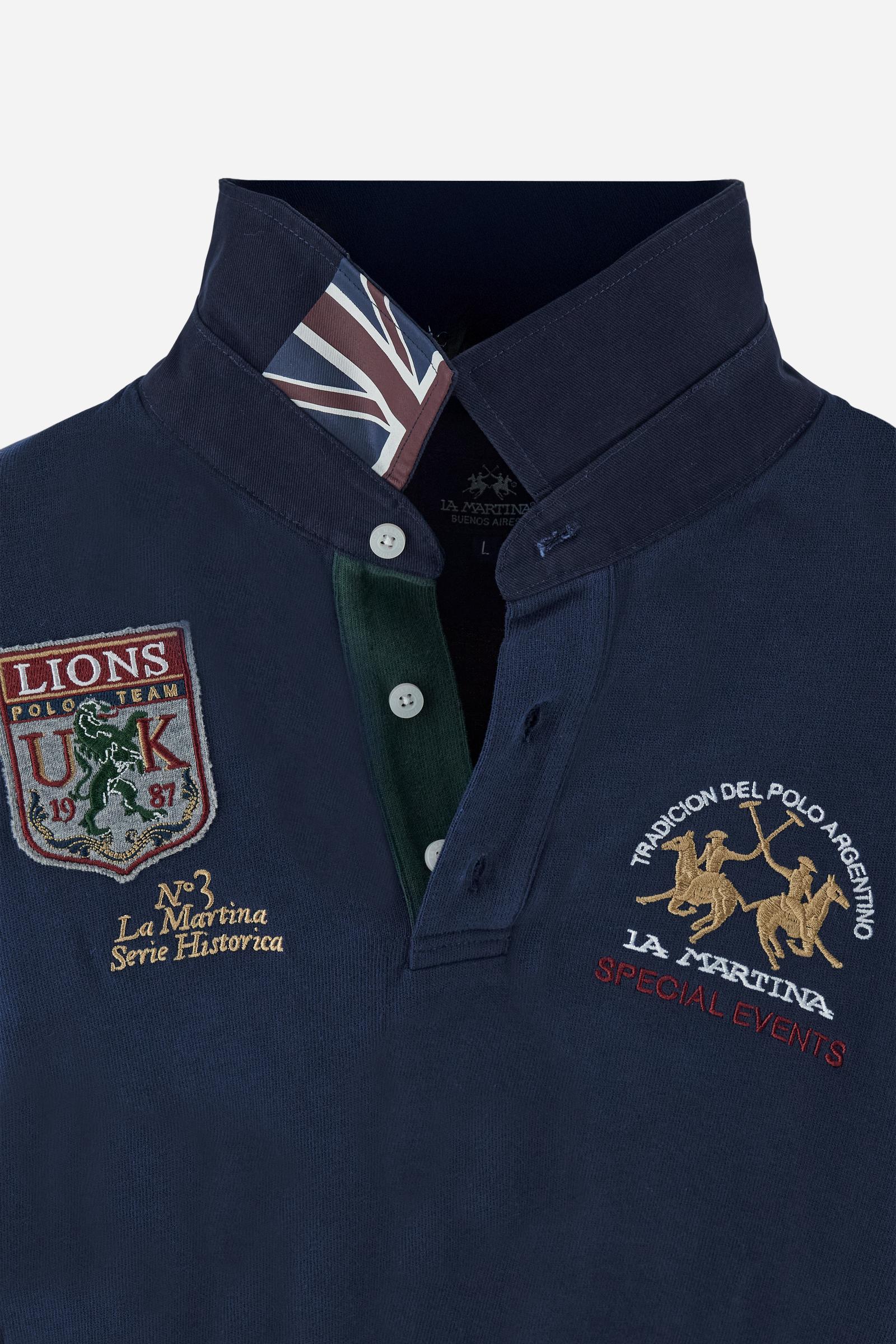 Long-sleeve polo shirt in 100% cotton jersey, soft and warm to the touch. Gabardine collar in tone with a contrast placket for a modern look. The English flag is printed under the raised right collar tip. Contrasting fabric bands and a patch with number 2 decorate the right sleeve, evoking polo player uniforms. Multicolor graphics dedicated to the English team and past special events enrich the design, with a large team logo embroidered in two-tone on the chest. Regular fit. Model wears size L. - Navy