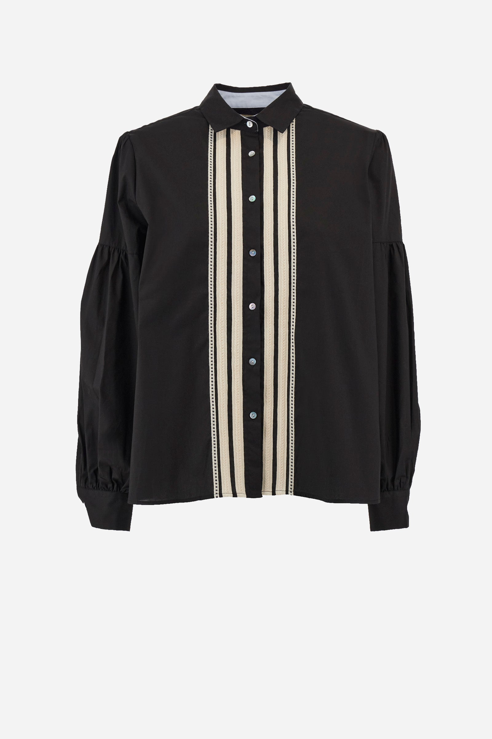 The Argentina women's shirt is made of solid-coloured stretch cotton, with an elegant regular fit. The design features a refined classic collar and button fastening with cable and openwork trims, giving the shirt a distinctive edge. The long sleeves, adorned at the top with a balloon effect, give the shirt a delicate and romantic look. Finally, the LM logo applied the sleeve completes the garment with a sophisticated and contemporary aesthetic. The model is 174 cm tall and wears a size 2. - Black