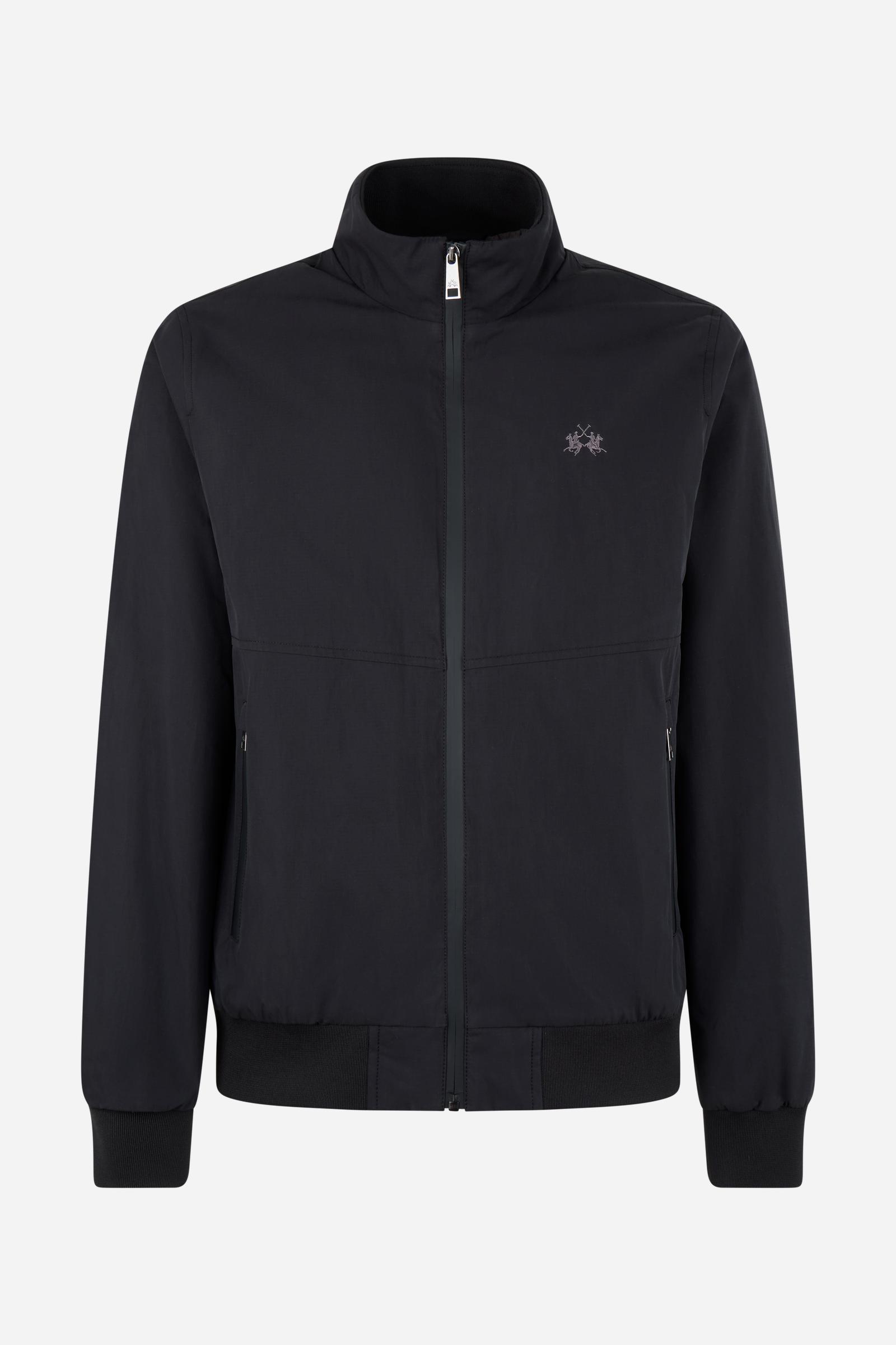 Men's padded jacket in cotton-polyamide blend for comfort and durability. Features high collar, zip closures, elastic ribbed trims, and polyester quilted lining - Black