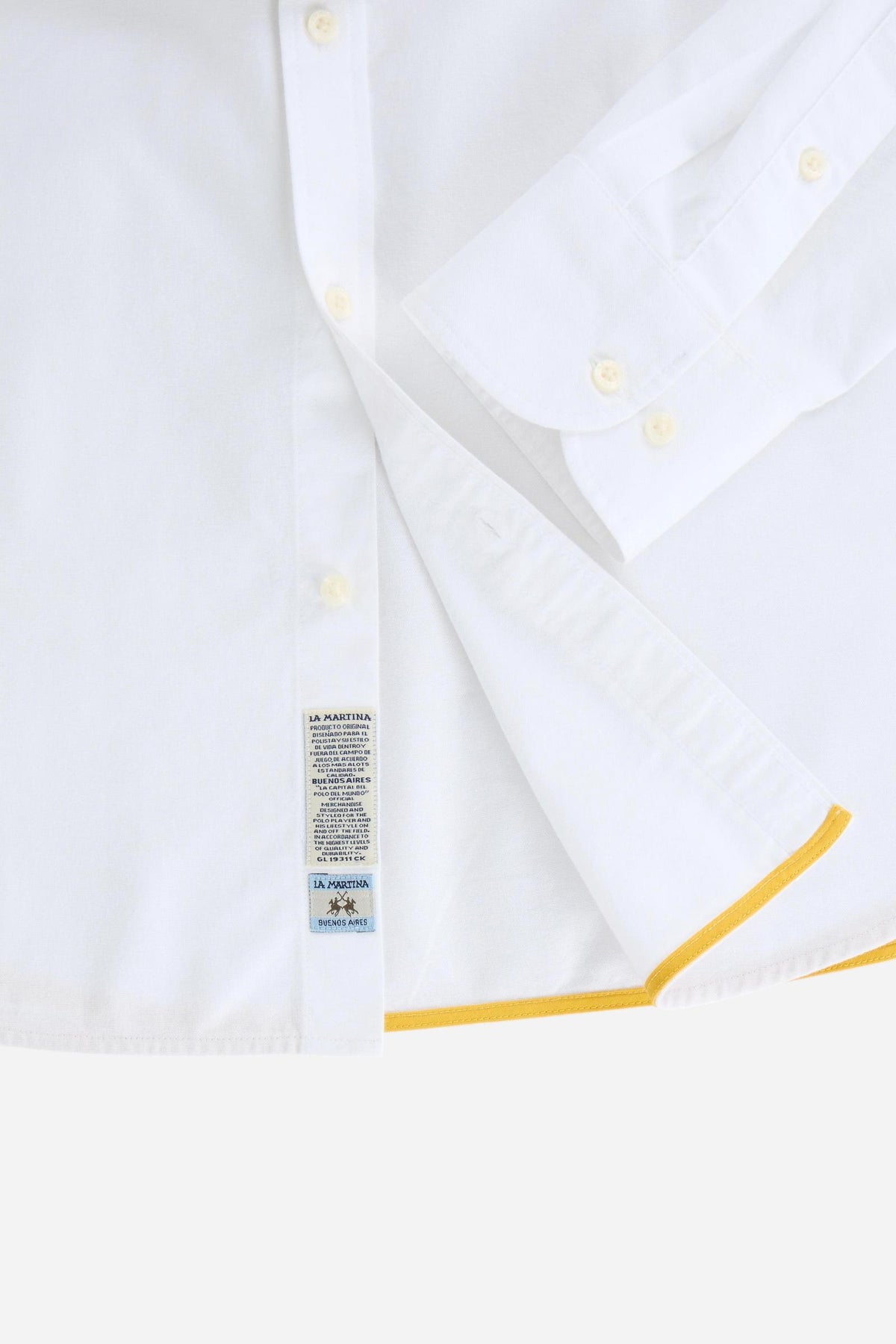 Men’s long-sleeve 100% cotton Oxford shirt with a soft texture, regular tailored fit, button-down collar, mother-of-pearl buttons, and detailed embroidered patches. - Optic White