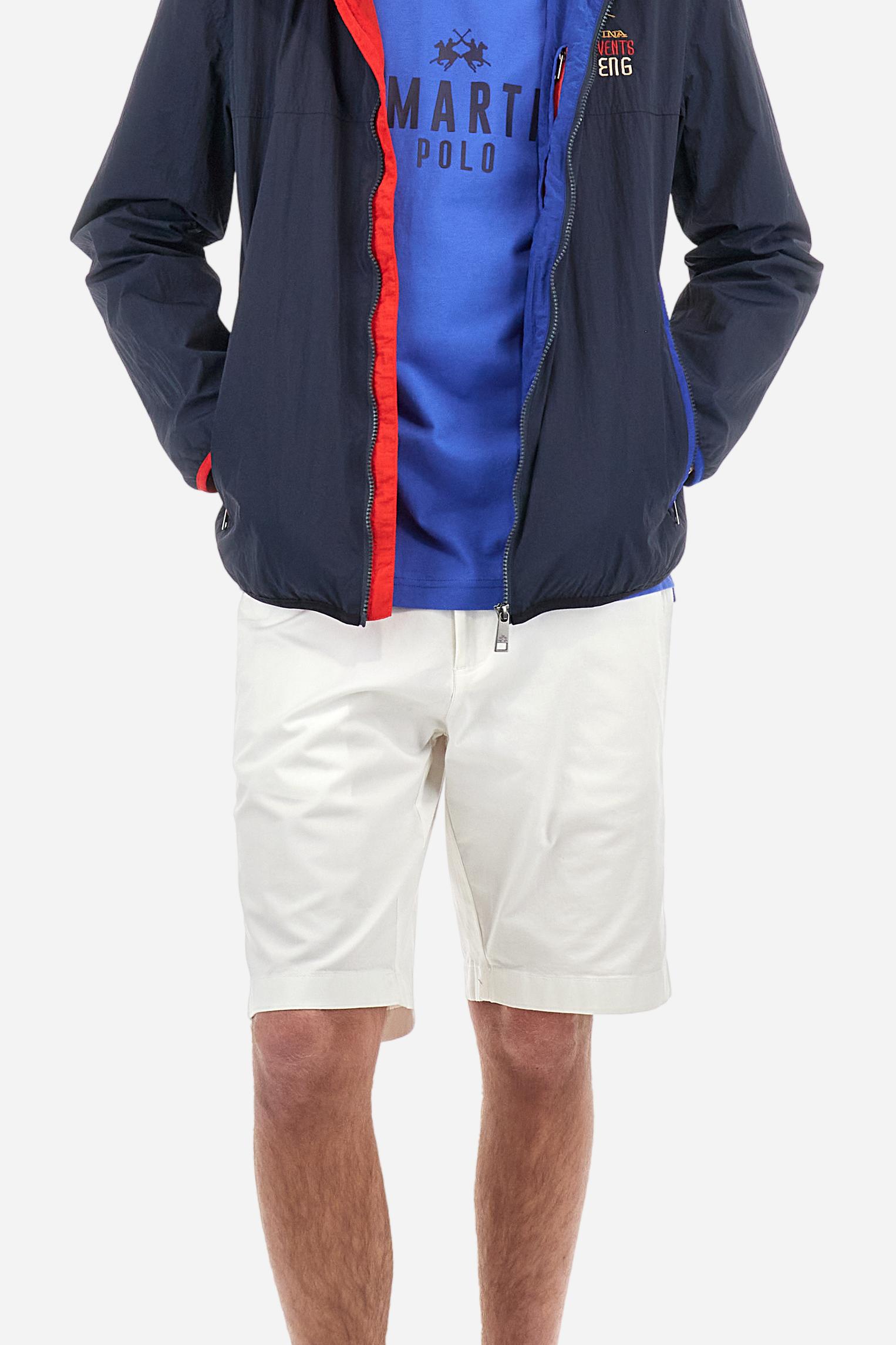 Men's single-colour crew-neck T-shirt with short sleeves, made of 100% cotton. The front features a printed logo and the lettering La Martina Polo. The number 3 is printed on one of the sleeves. Regular fit. The model is wearing a size L. - Dazzling Blue