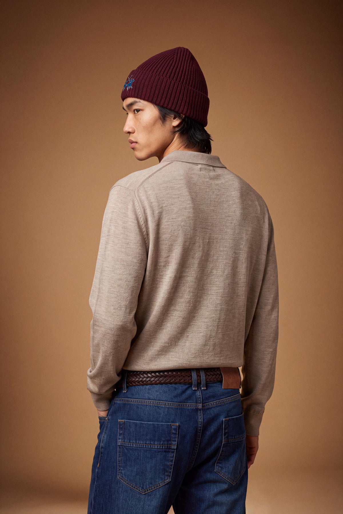 Men's long-sleeve polo made from 100% merino wool offers a comfortable fit, classic knitted collar, ribbed cuffs, and a subtle embroidered logo on the chest. - Vintage Khaki