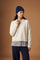 Women's long-sleeve knitted polo in soft lambswool blend, featuring a relaxed cropped fit, ribbed cuffs, shirt-style collar, and smooth, compact knit surface. - Antique White