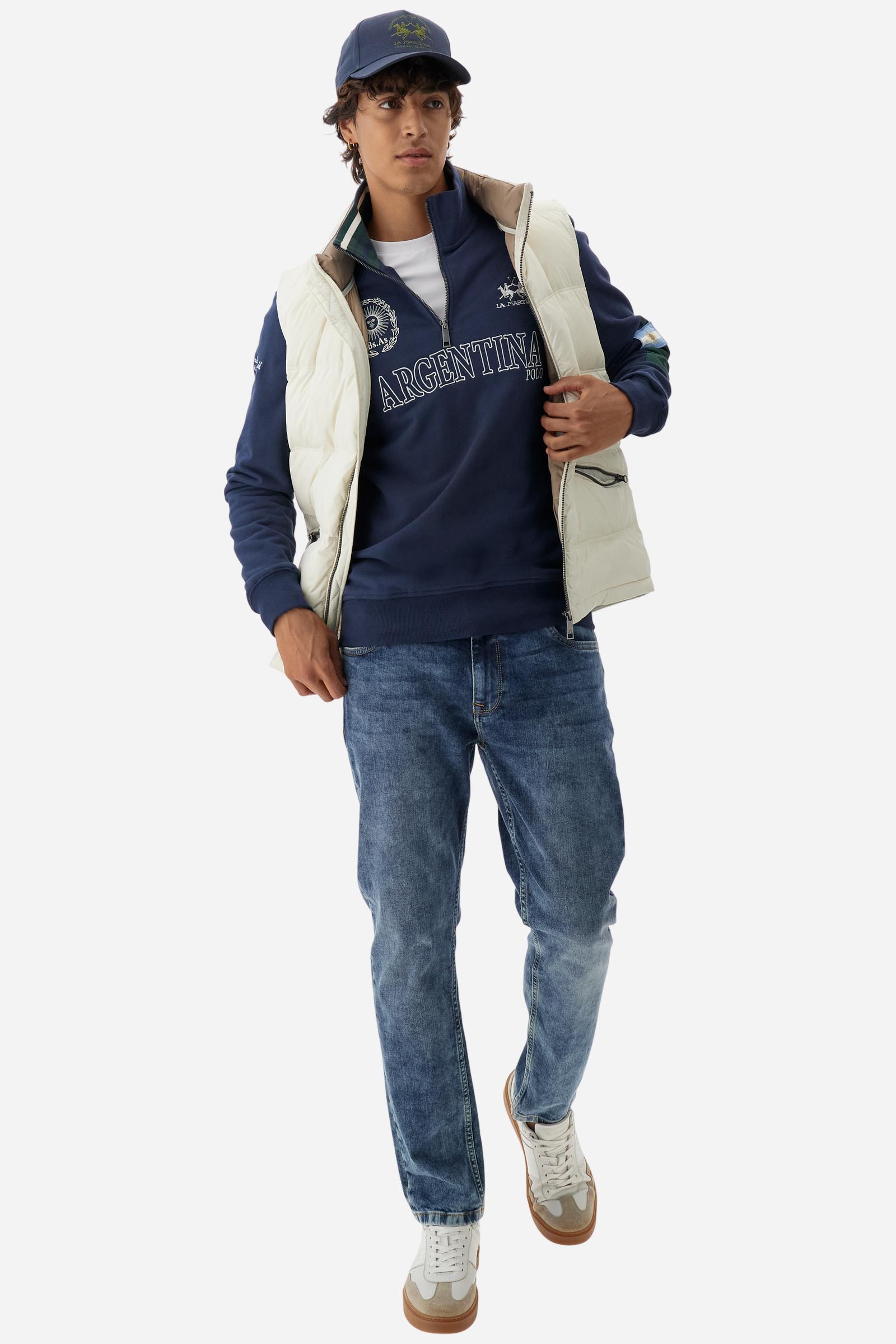 Men's long-sleeved solid colour sweatshirt in cotton. Made of pure cotton fabric with a soft, velvety touch. Practical half-zip opening and ribbed cuffs and collar details. Vivid multi-coloured with Argentina-inspired graphics on the chest and sleeves. The logo is embroidered on the left side of chest for a subtle touch of branding. The fit is regular to suit everyday wear. The model is wearing a size L. - Navy