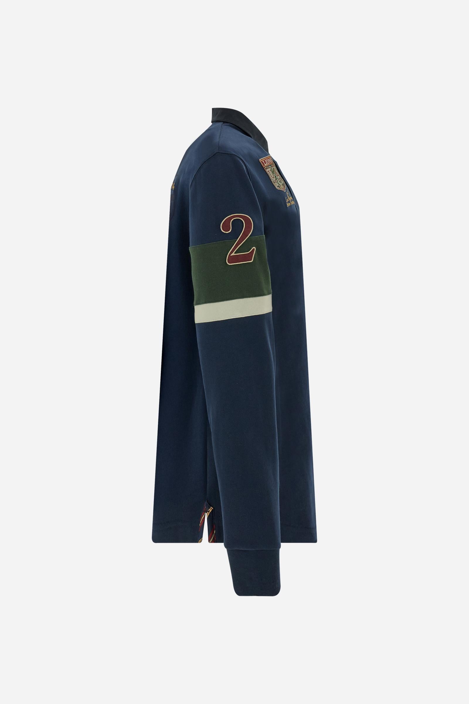 Long-sleeve polo shirt in 100% cotton jersey, soft and warm to the touch. Gabardine collar in tone with a contrast placket for a modern look. The English flag is printed under the raised right collar tip. Contrasting fabric bands and a patch with number 2 decorate the right sleeve, evoking polo player uniforms. Multicolor graphics dedicated to the English team and past special events enrich the design, with a large team logo embroidered in two-tone on the chest. Regular fit. Model wears size L. - Navy