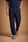 Men's long trousers in wool-polyester blend with elastane for comfort and durability. Relaxed fit, wide legs, elastic waistband, pleats, and detailed pockets. - Navy