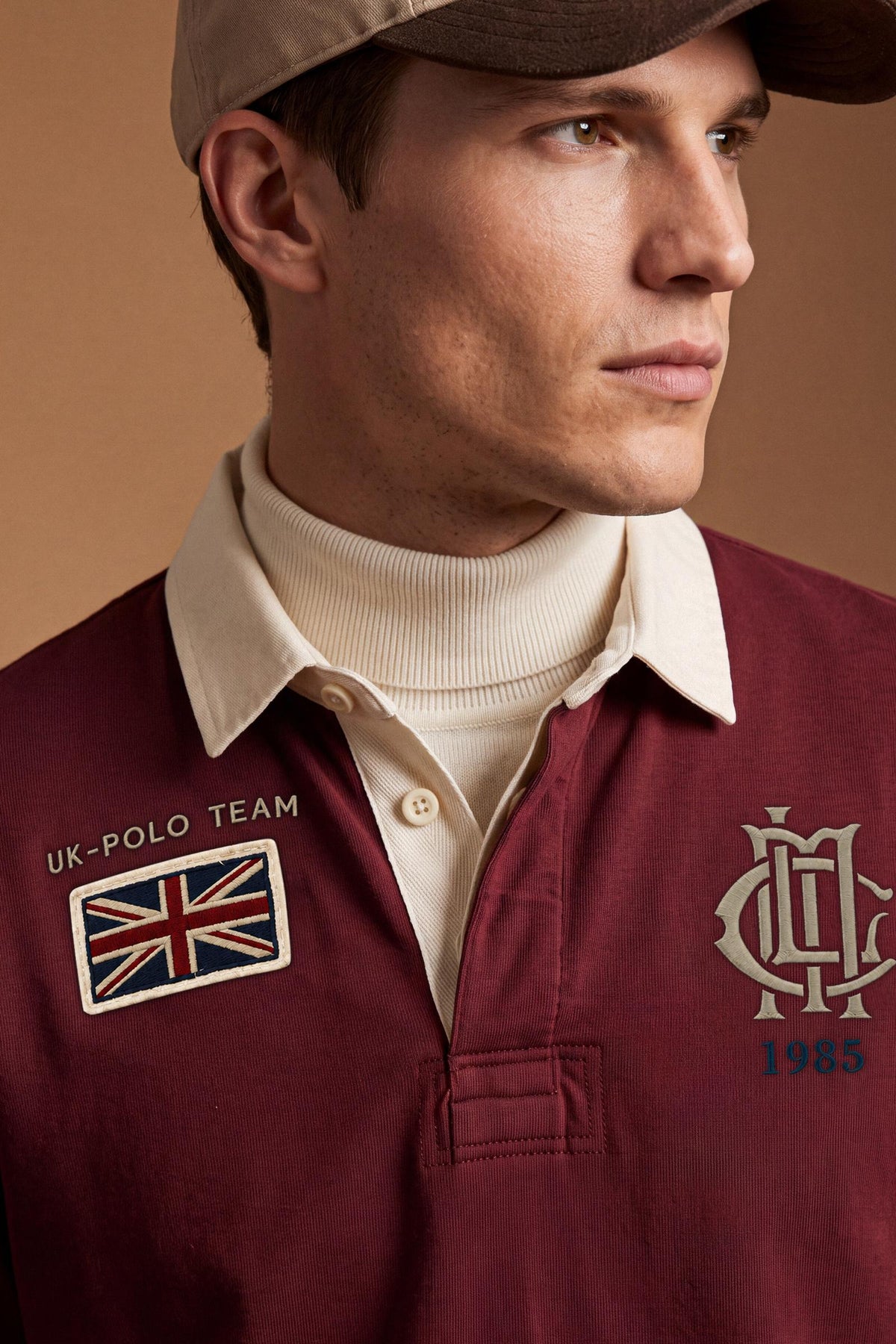 Men’s long-sleeve polo in heavy pure cotton jersey with textured fabric, hidden placket, ribbed cuffs, and heritage British polo graphic for a classic, clean fit. - Red Dahlia