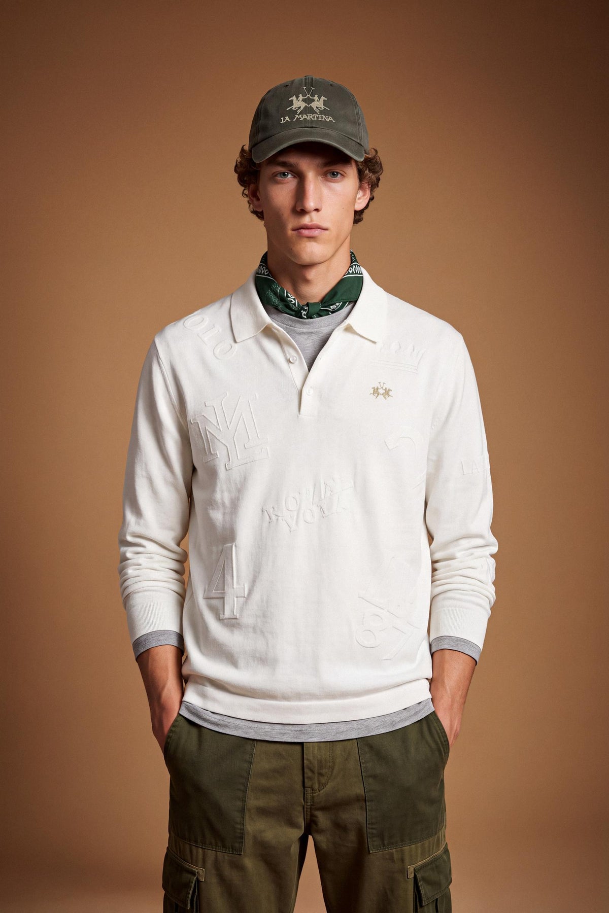 Men’s long-sleeve sweater in 100% combed cotton with a regular fit, jacquard knit patterns, ribbed cuffs and hem, a polo collar, and a three-button front opening. - Pristine