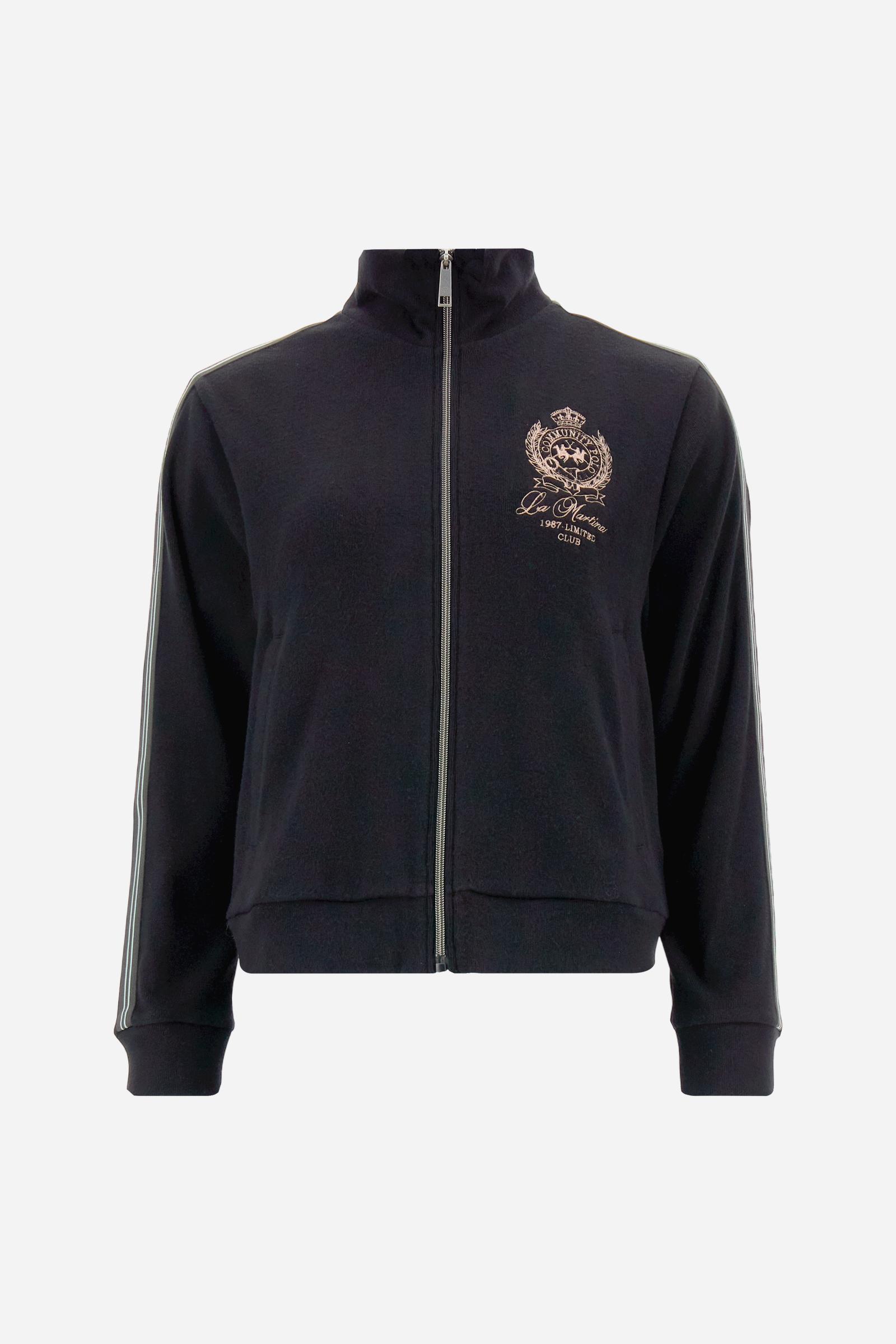 Women’s full-zip sweatshirt with long sleeves in soft interlock viscose blend, offering a luxurious feel on the skin. Straight cut with fluid line and sport-luxury details. Striped bands on the sleeves and heraldic embroidery on the chest add a contemporary touch. The model wears size 2. - Black
